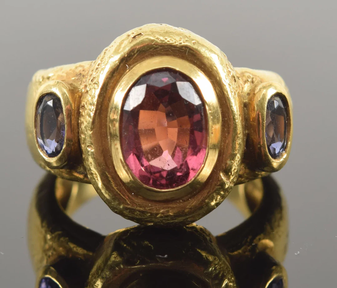 18K gold Renaissance Revival style tourmaline mounted ring. Central