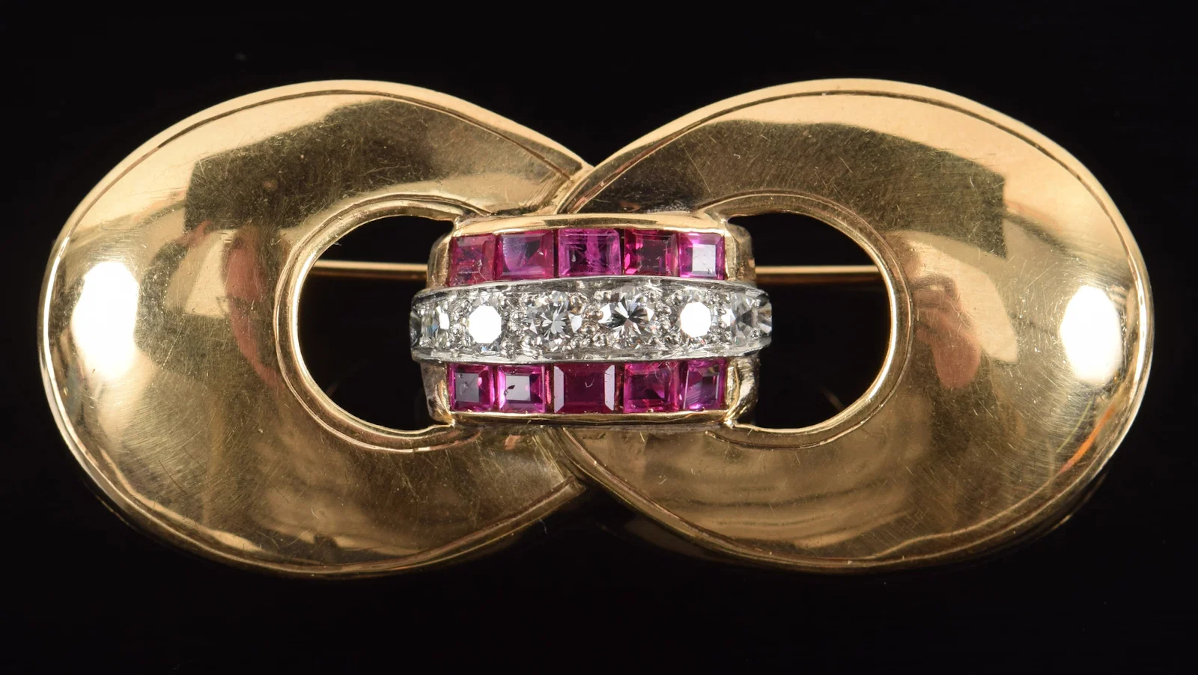 Retro 14K gold diamond and ruby buckle form pin. Central channel of