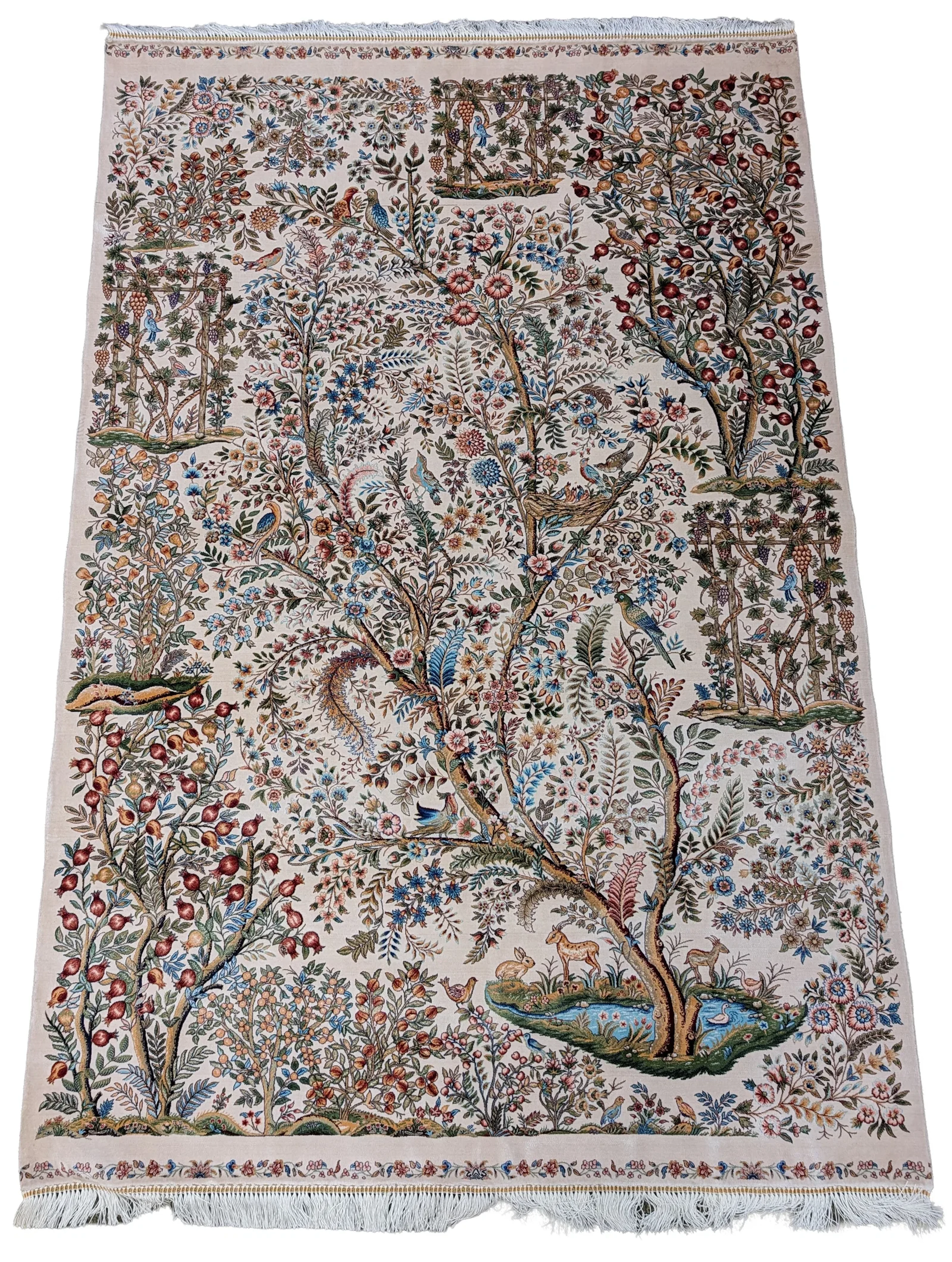 Silk Qum area rug. Decoration of birds, animals, pomegranates, and