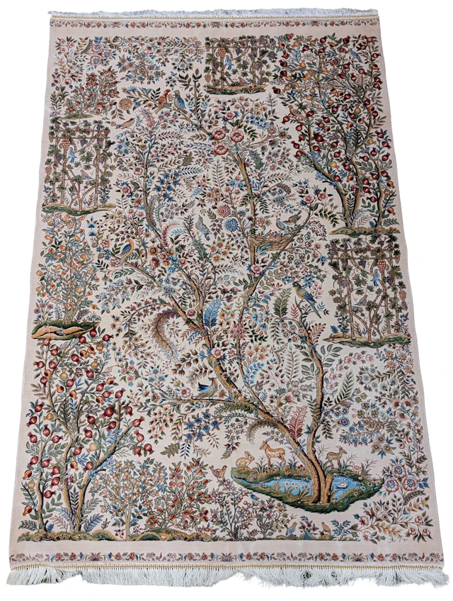 Silk Qum area rug. Decoration of birds, animals, pomegranates, and