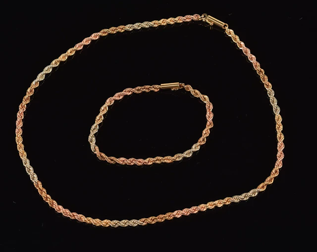 14K tri-color gold rope twist chain necklace and bracelet. Clasps