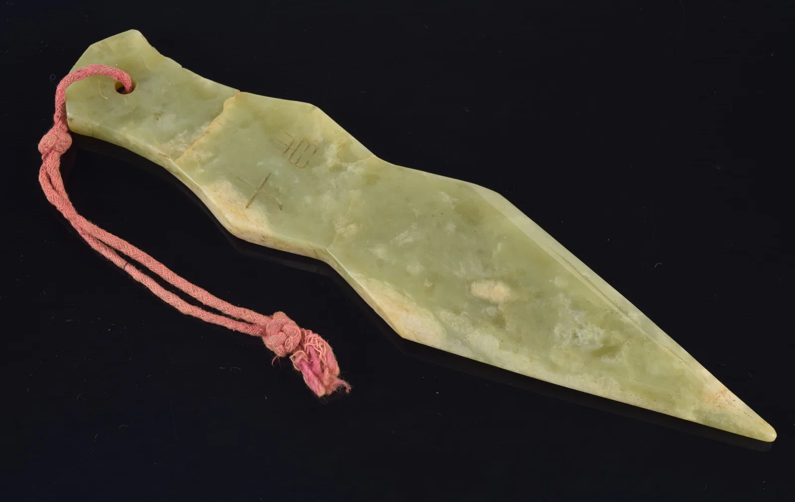 Chinese carved jade ceremonial dagger, early 20th century. Beveled