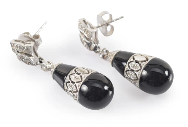18K white gold diamond and onyx drop earrings. Teardrop form drop