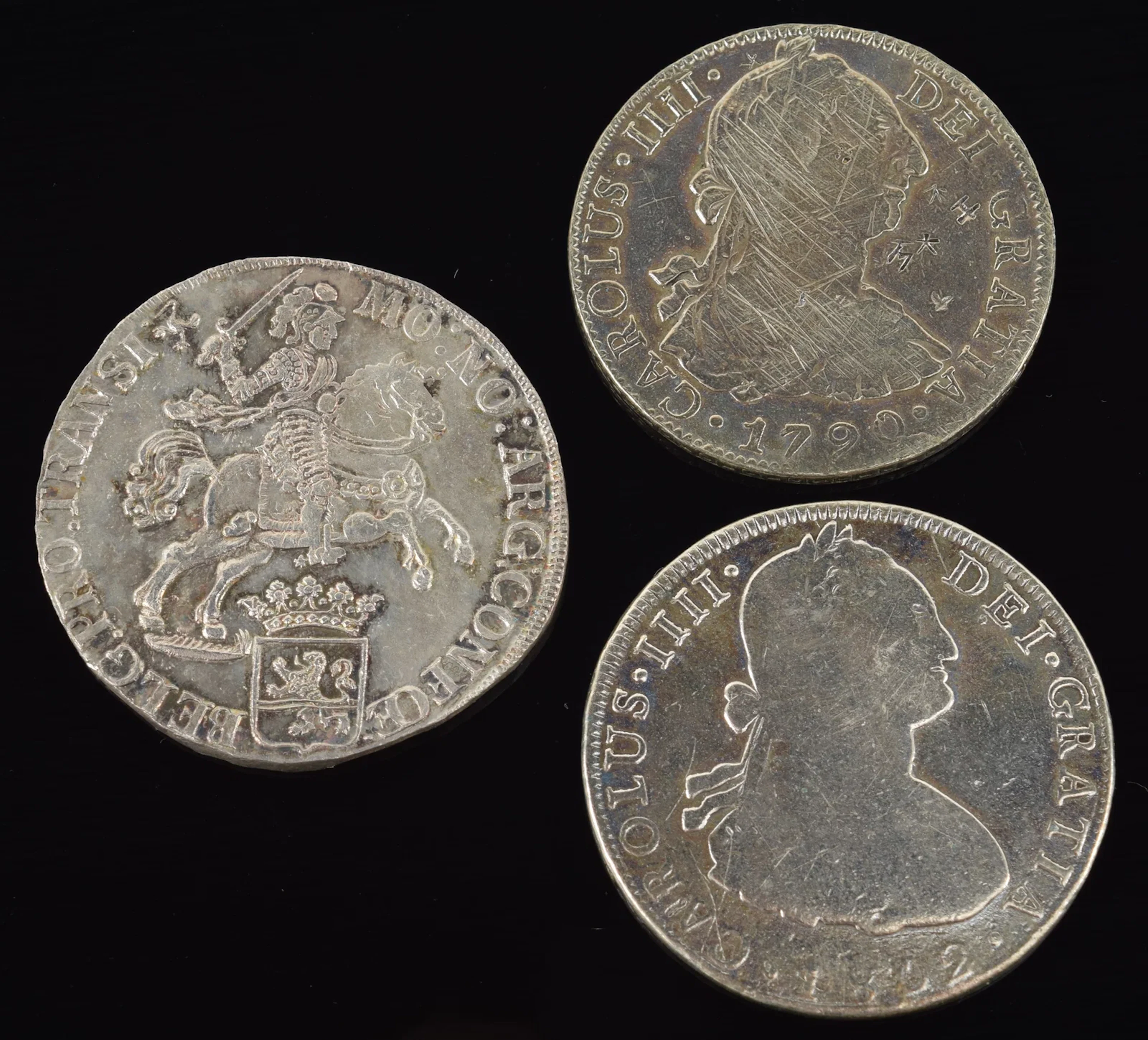 3 silver coins. To include: 1) 1734 Dutch "Silver Rider" coin. 32.4