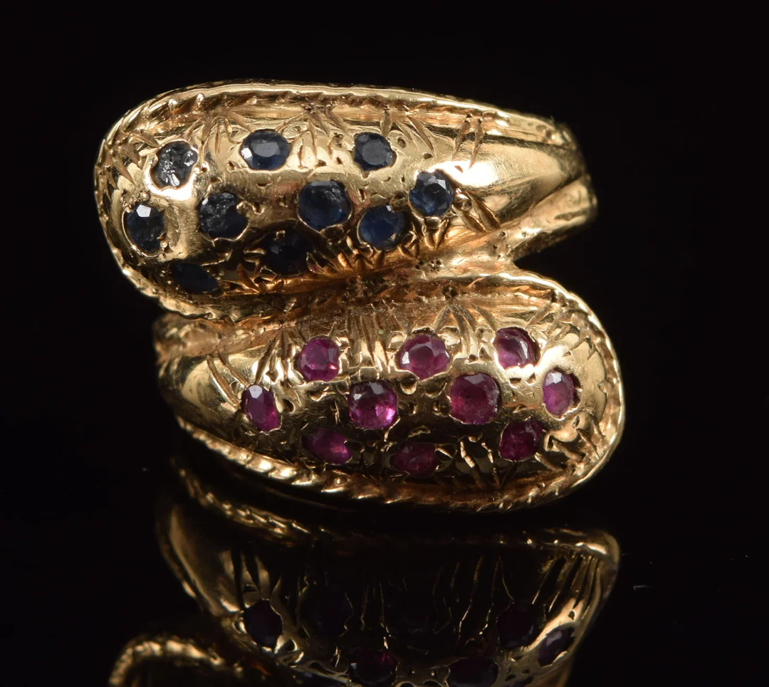Vintage 14K gold ruby and sapphire bypass ring. 10 each of rubies