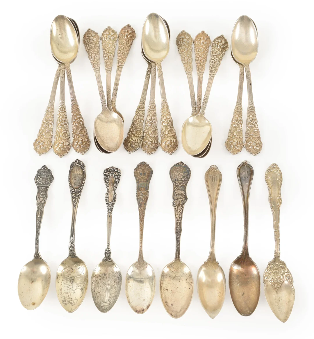 22 Assorted sterling silver tea spoons, including souvenir and floral
