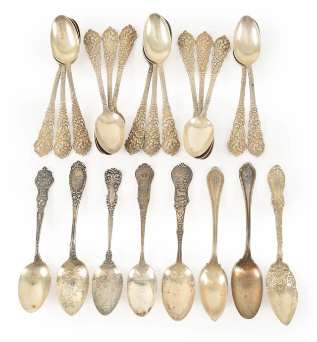 22 Assorted sterling silver tea spoons, including souvenir and floral