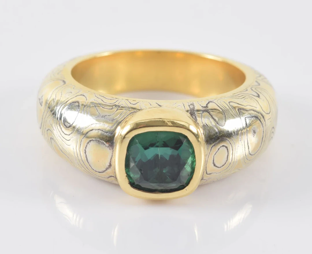 Richard Wise mixed metal mokume gane tourmaline mounted ring. 18K