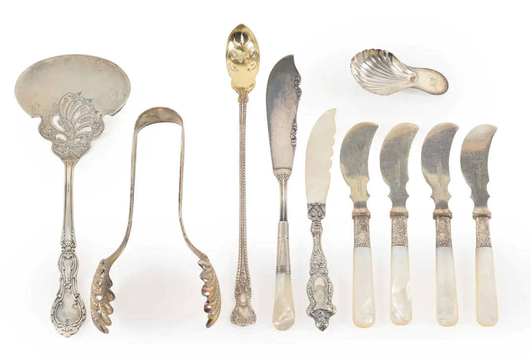Collection of 10 silver serving items including a pair of Sterling
