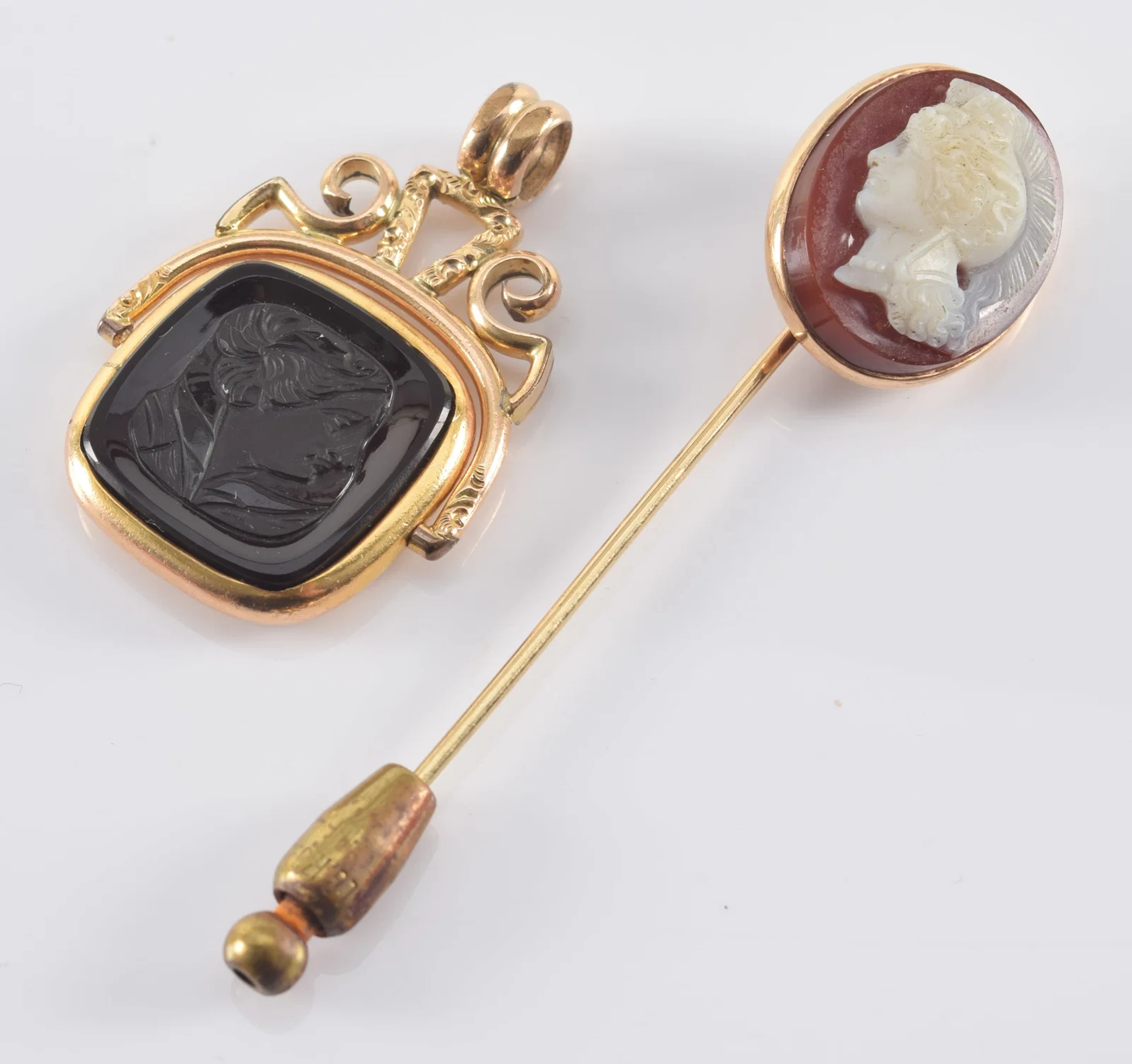 Antique 14K gold carved agate stick pin. Cameo carving of a classical