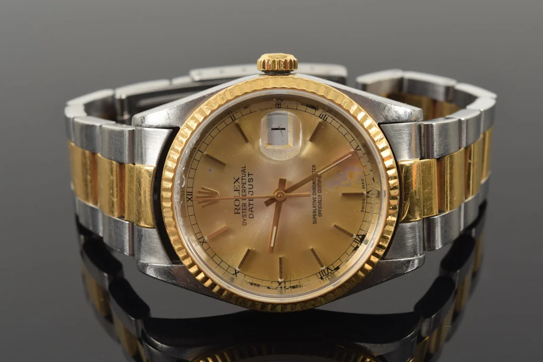 Rolex Men's Oyster Perpetual gold and stainless steel watch. Back