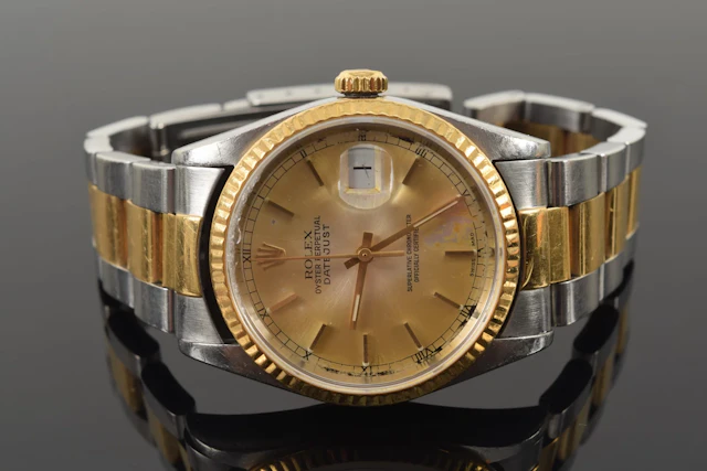 Rolex Men's Oyster Perpetual gold and stainless steel watch. Back