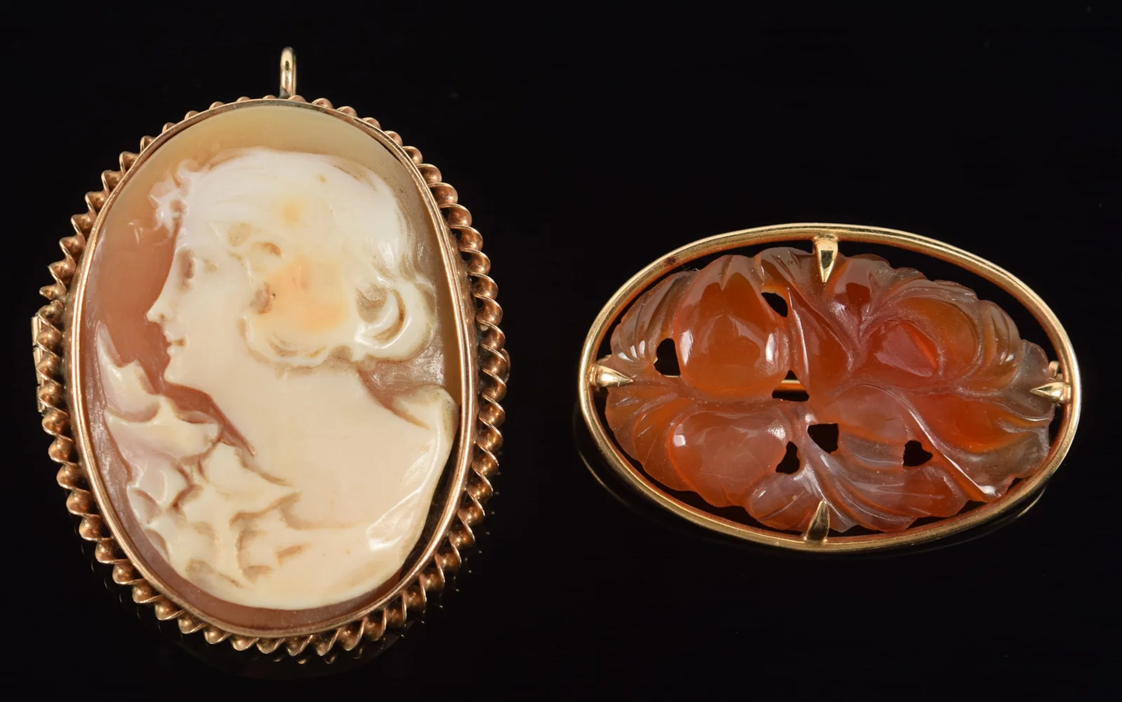 2 gold pins. To include: 1) 10K gold cameo pin/pendant. Unmarked.