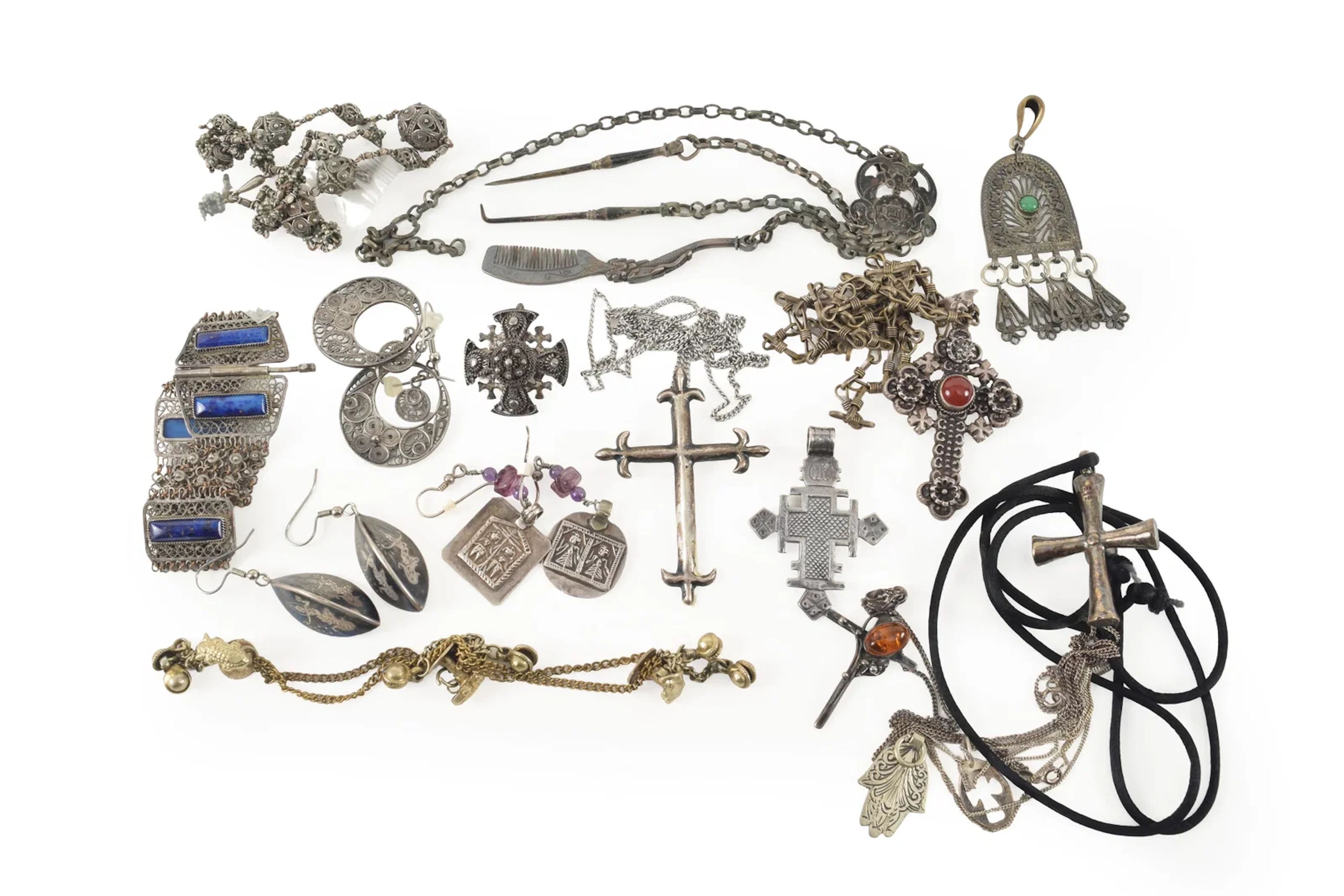 Assortment of vintage silver and base metal jewelry. To include: lapis