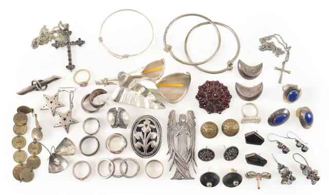 Selection of silver jewelry. To include gem set crucifix pendant necklace