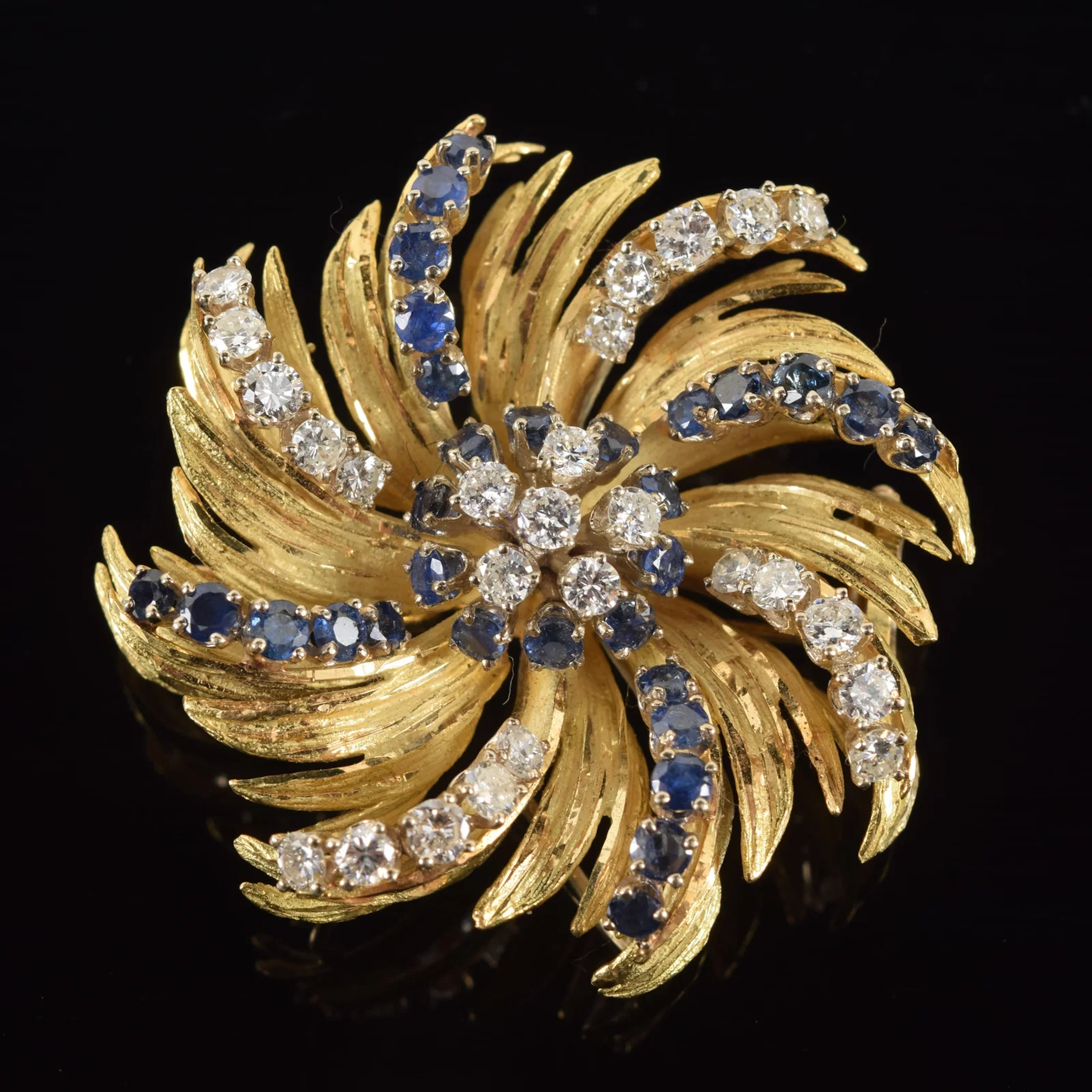 Tishman & Lipp 18K gold sapphire and diamond heavy pin/pendant. Radiating