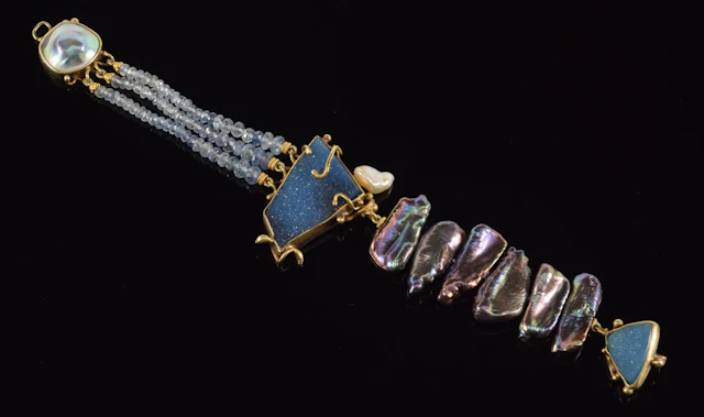 14K gold and sterling silver designer bracelet. Blue geode specimens