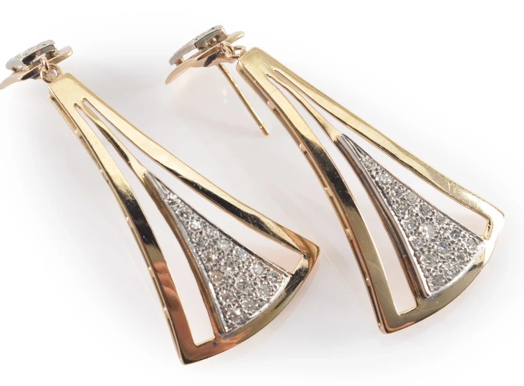 14K gold diamond drop earrings. Openwork triangular form drop. Settings