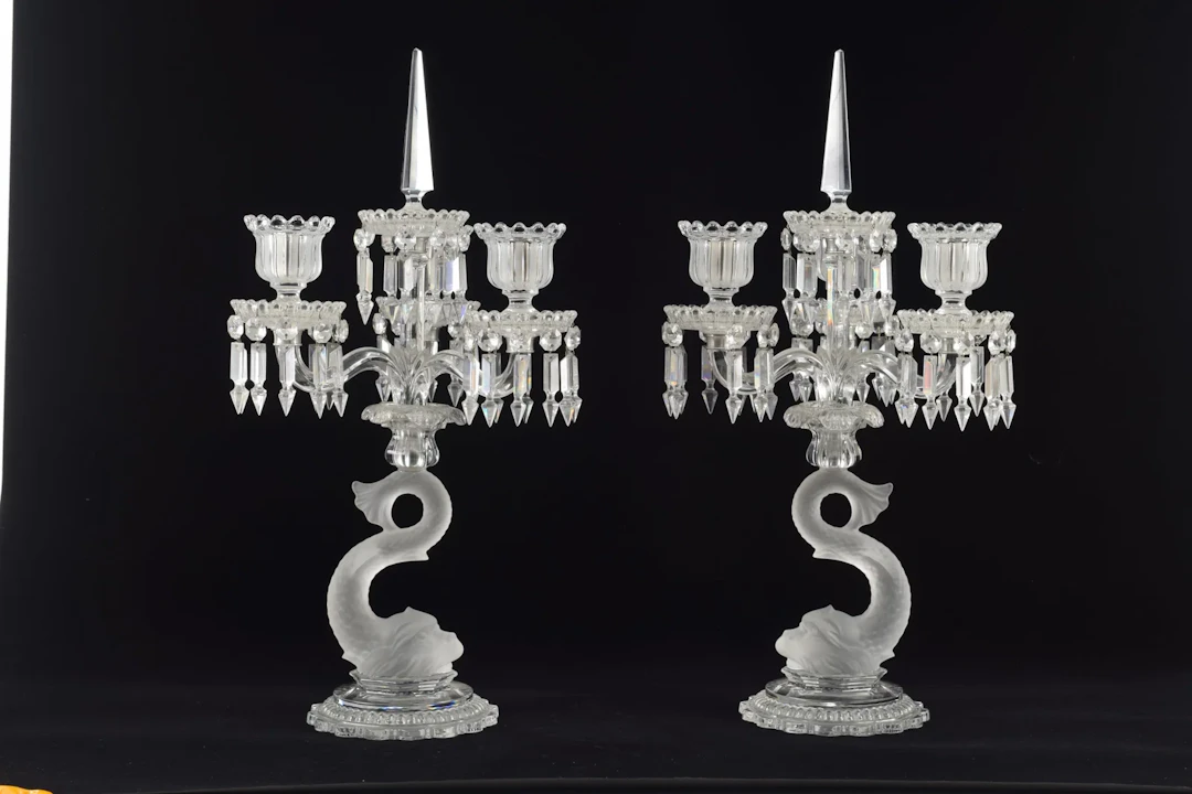Pair of fine Baccarat crystal candelabras with dolphin standards and