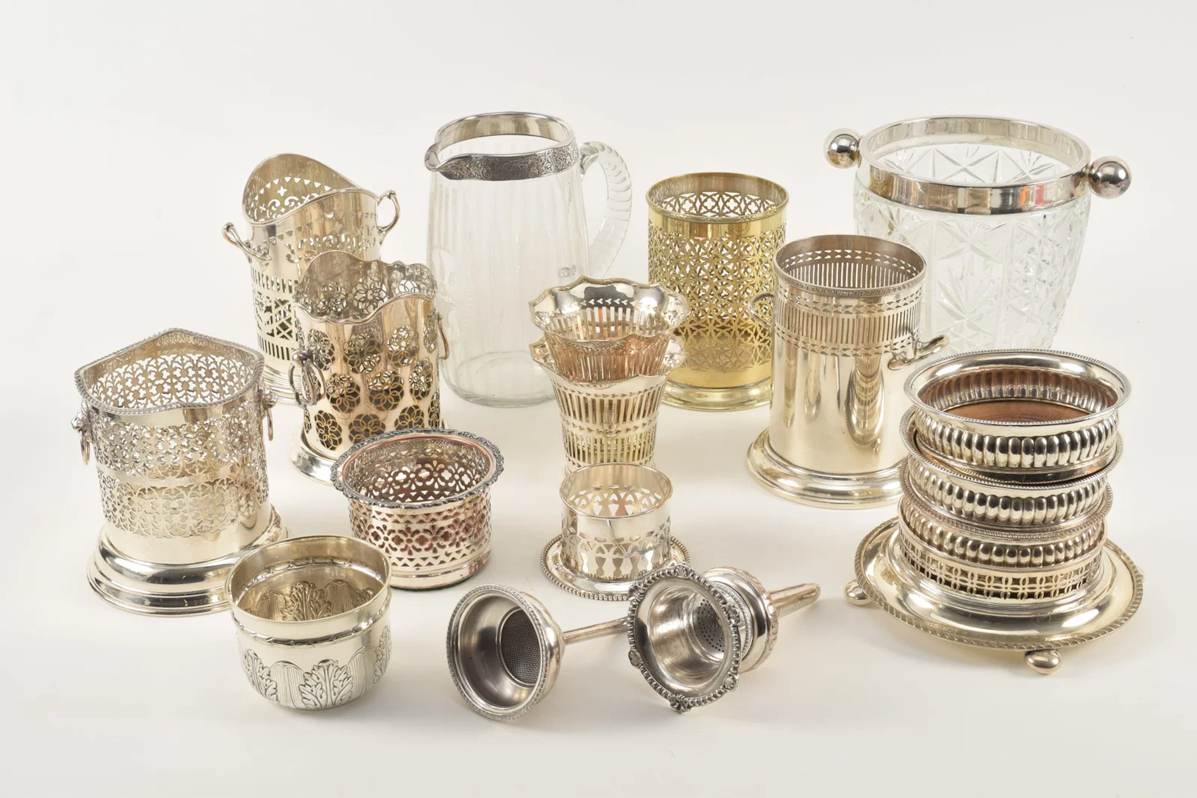 Large selection of silver plated accessories, including wine funnel