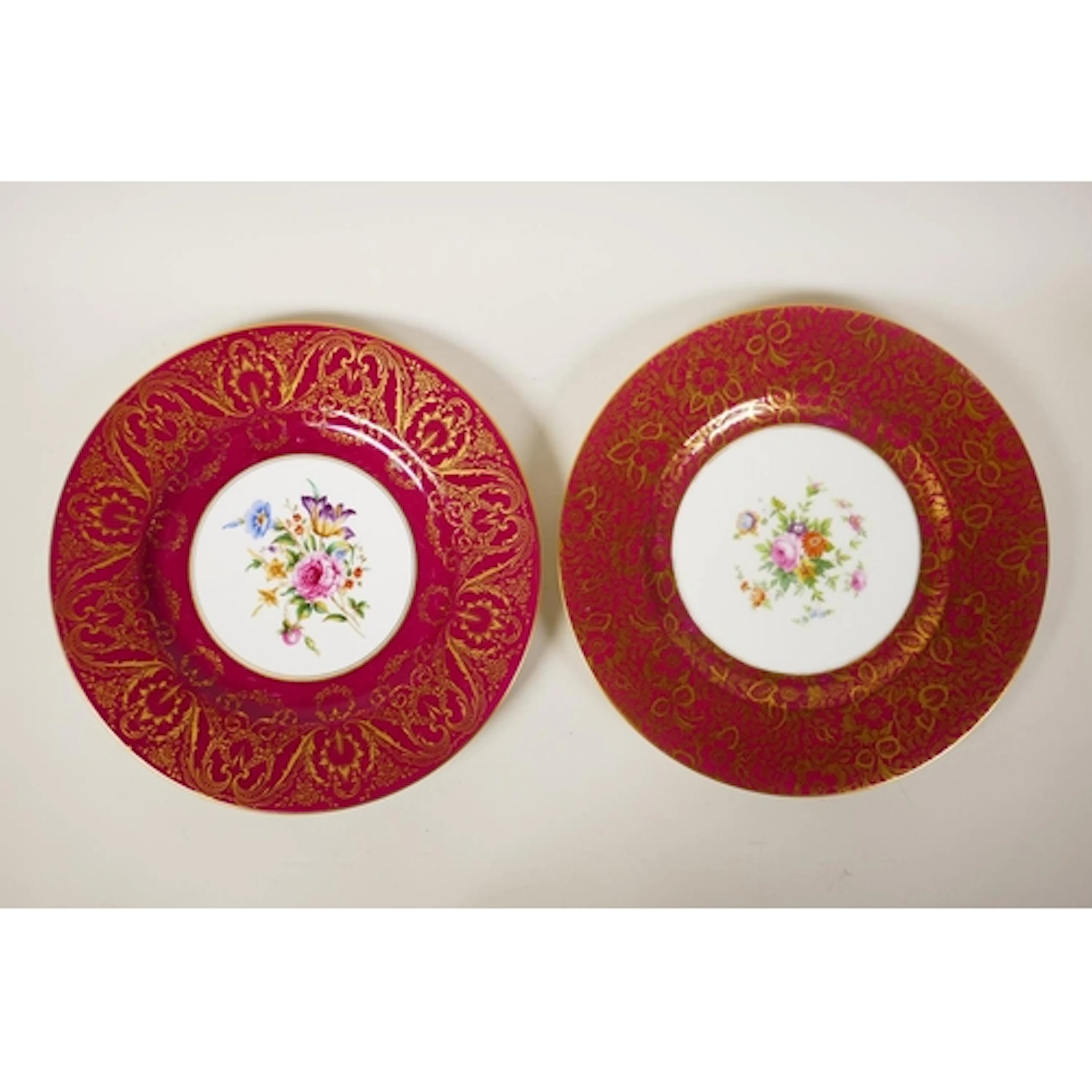 A Royal Worcester red ground porcelain cabinet plate with fl...