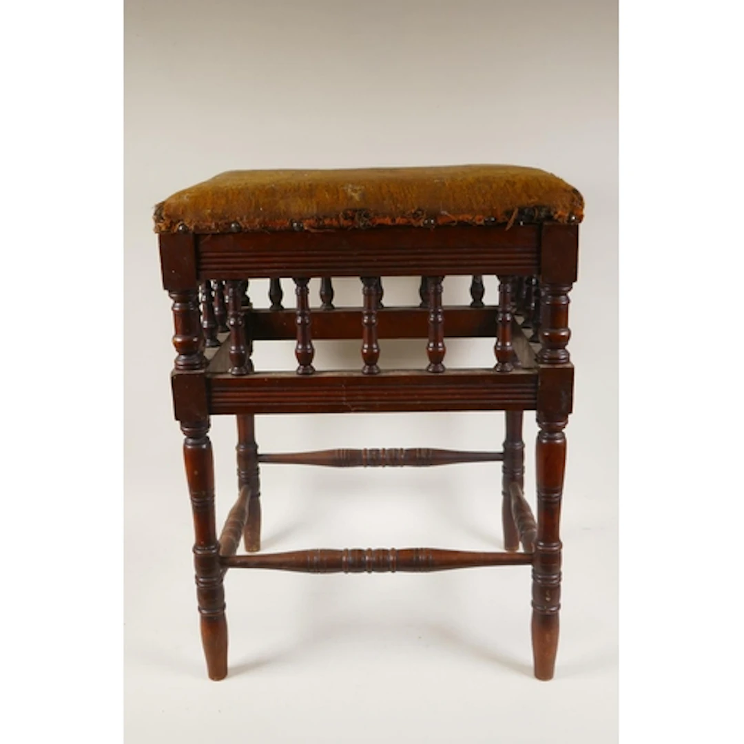 C19th walnut stool in the manner of Godwin with spindle turn...