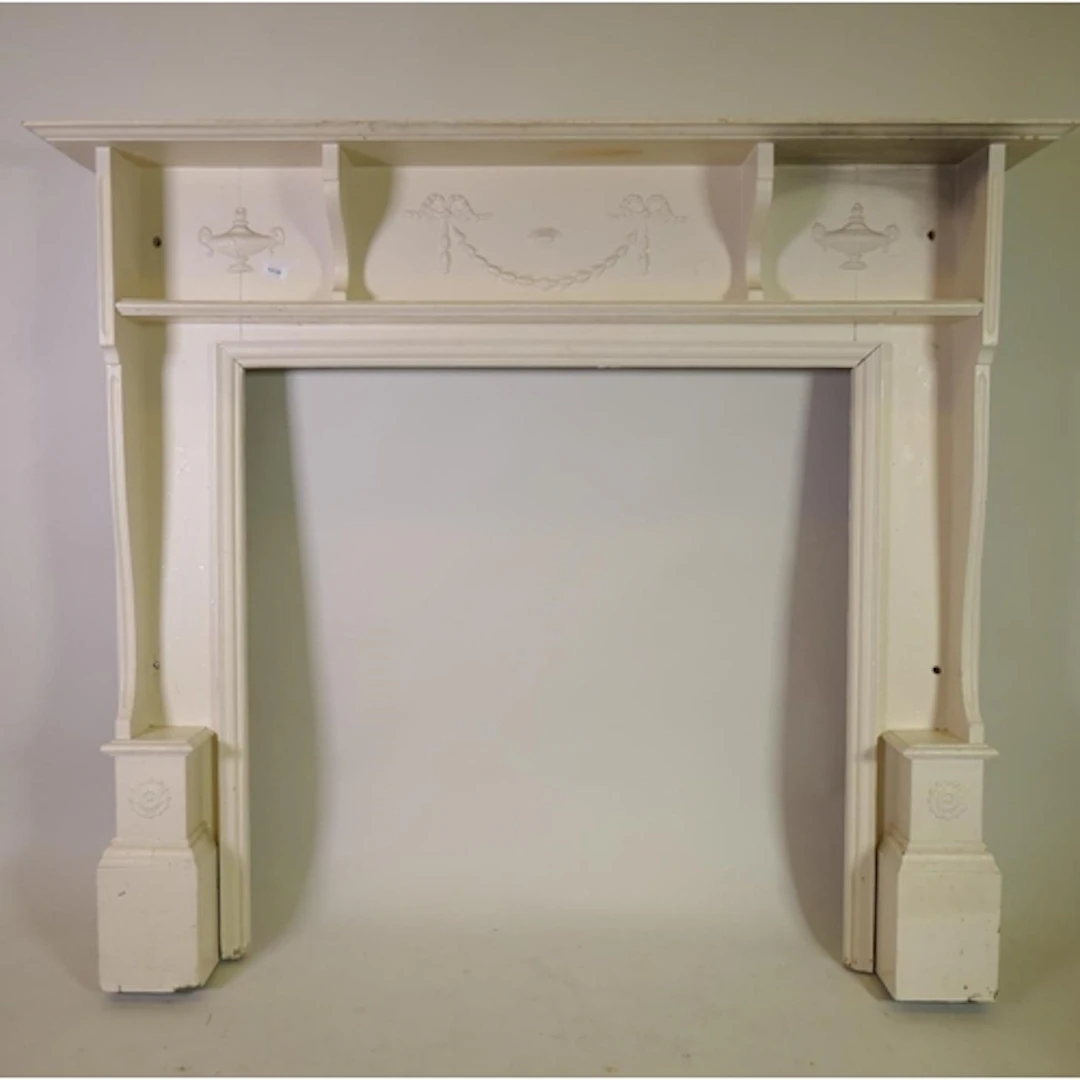 Antique painted pine fire surround with Adam style decoratio...