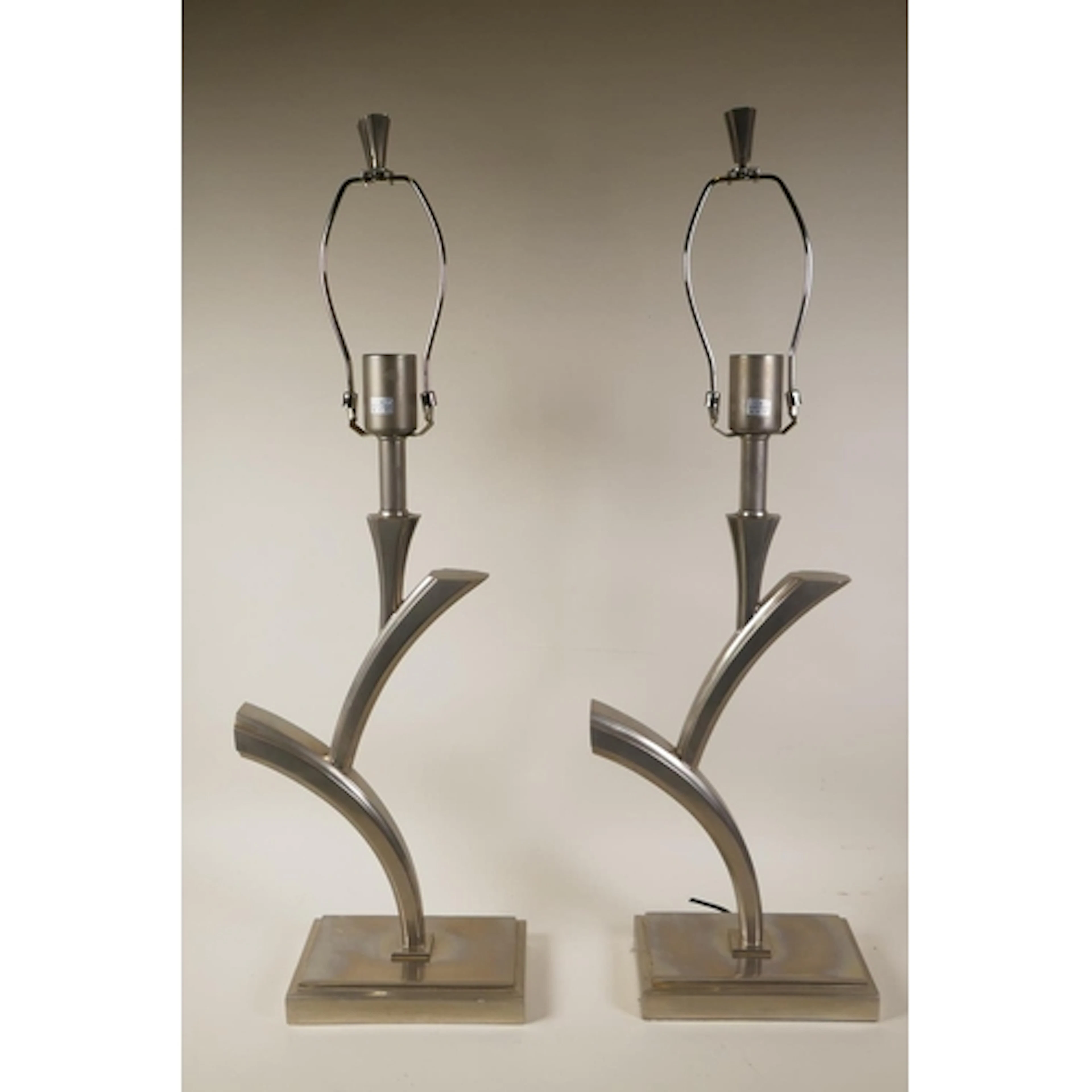 A pair of contemporary polished steel table lamps, 74cm high