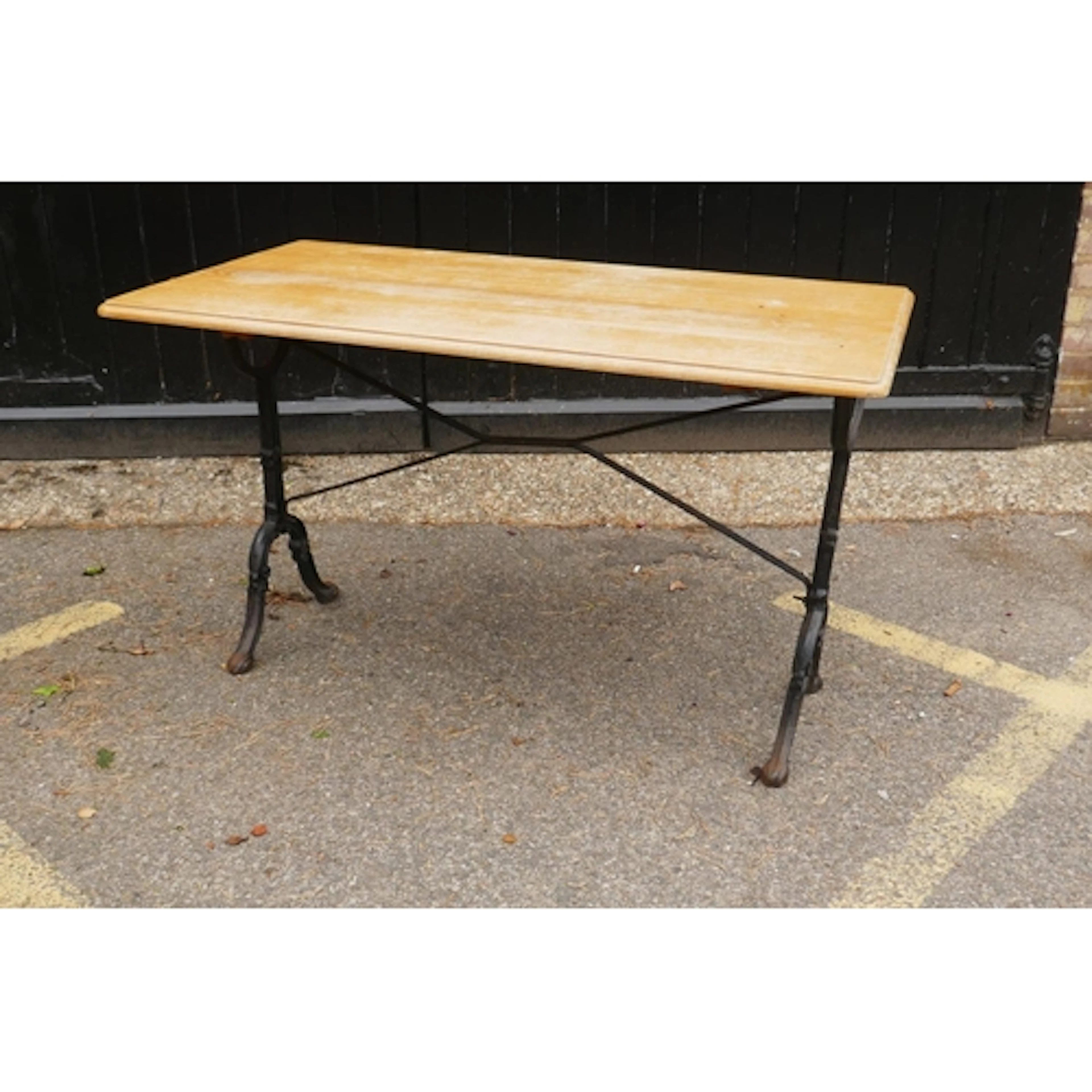 Victorian style painted cast iron pub table with pine top, 1...