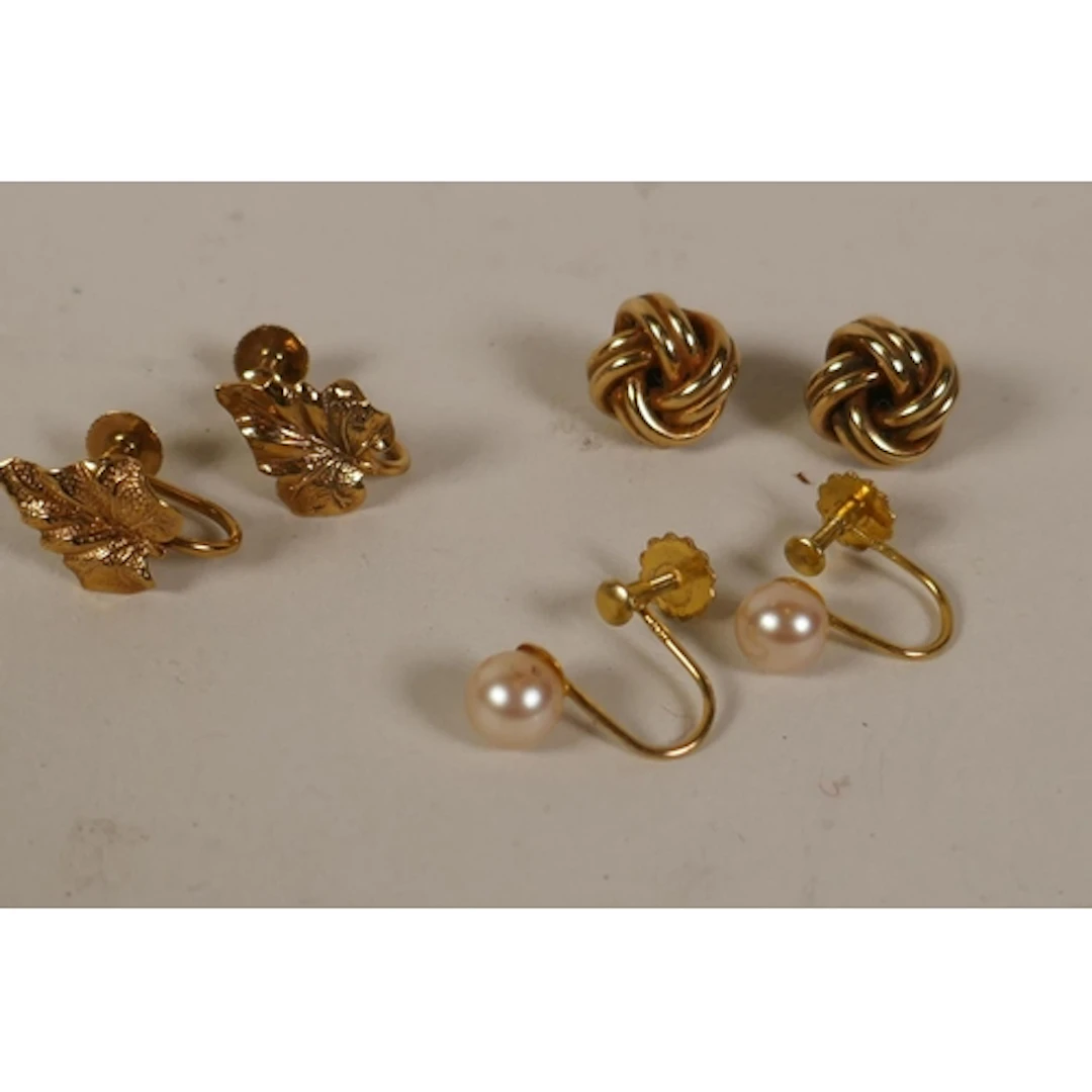 Pair of 9ct gold knot shaped earrings, 2.9g, and a pair of 9...