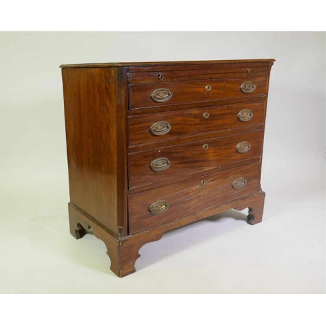 A Georgian mahogany bachelor's chest with brushing slide ove...