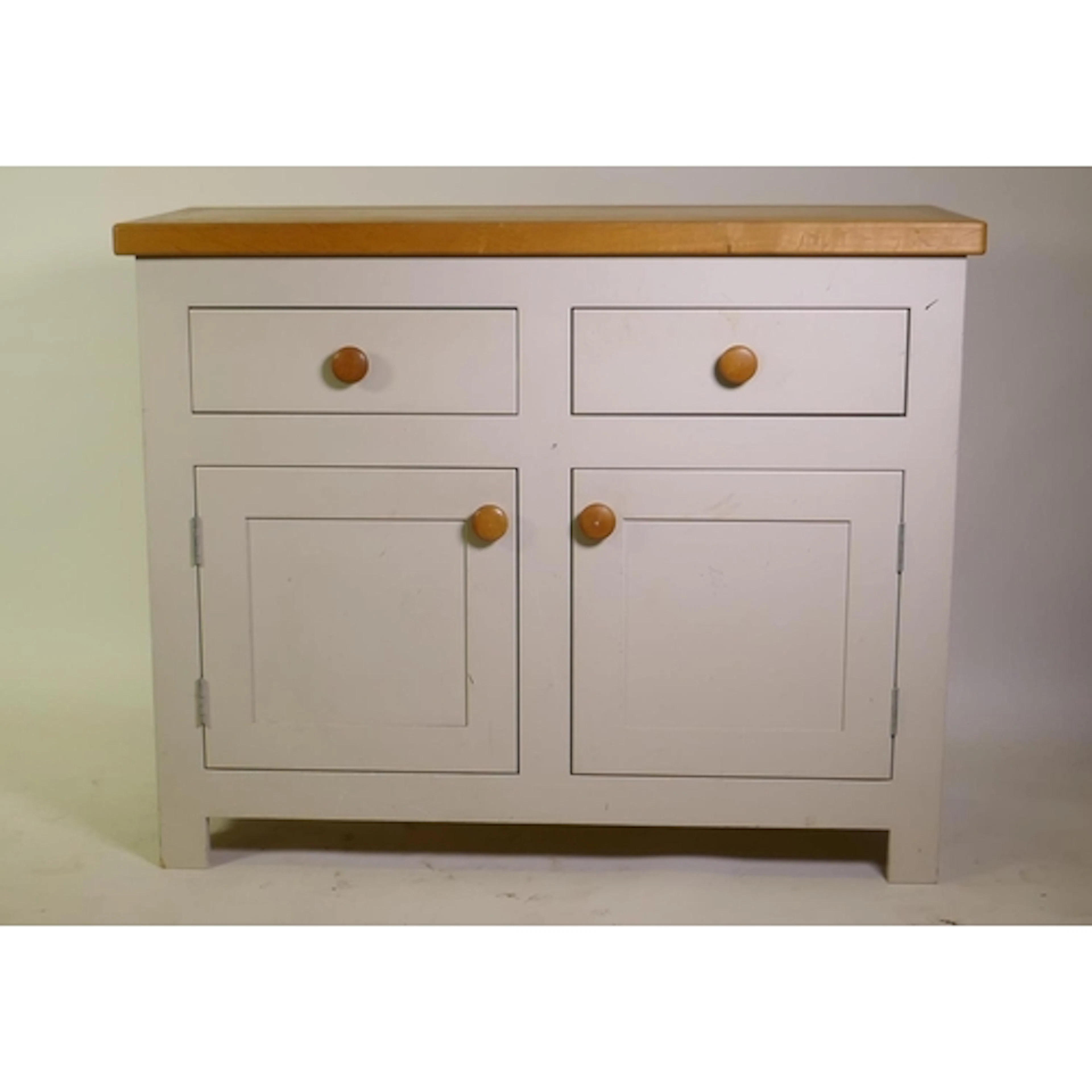 A painted side cupboard with oak top over two soft close dra...