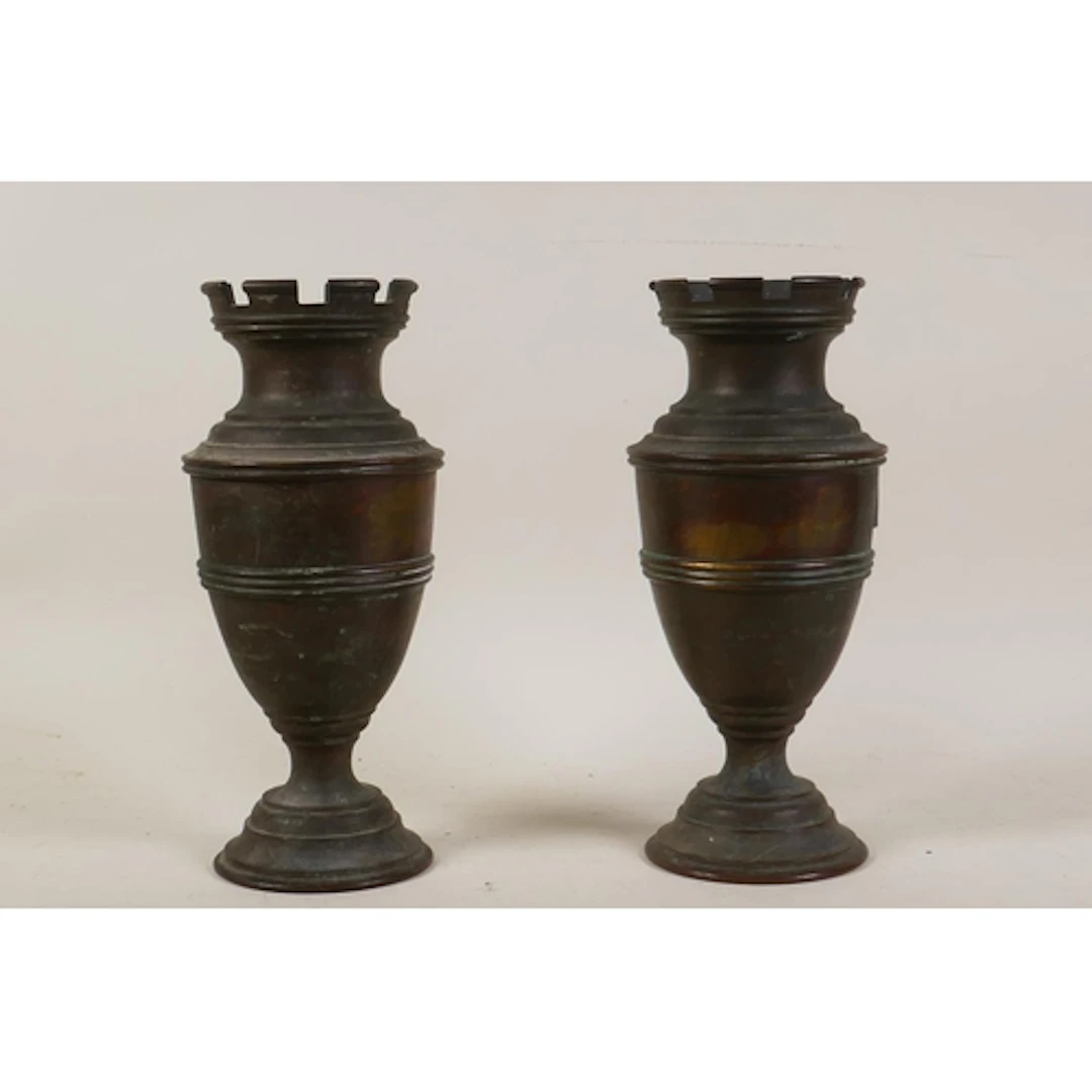 Pair of C19th bronze vases with castellated tops, 23cm high