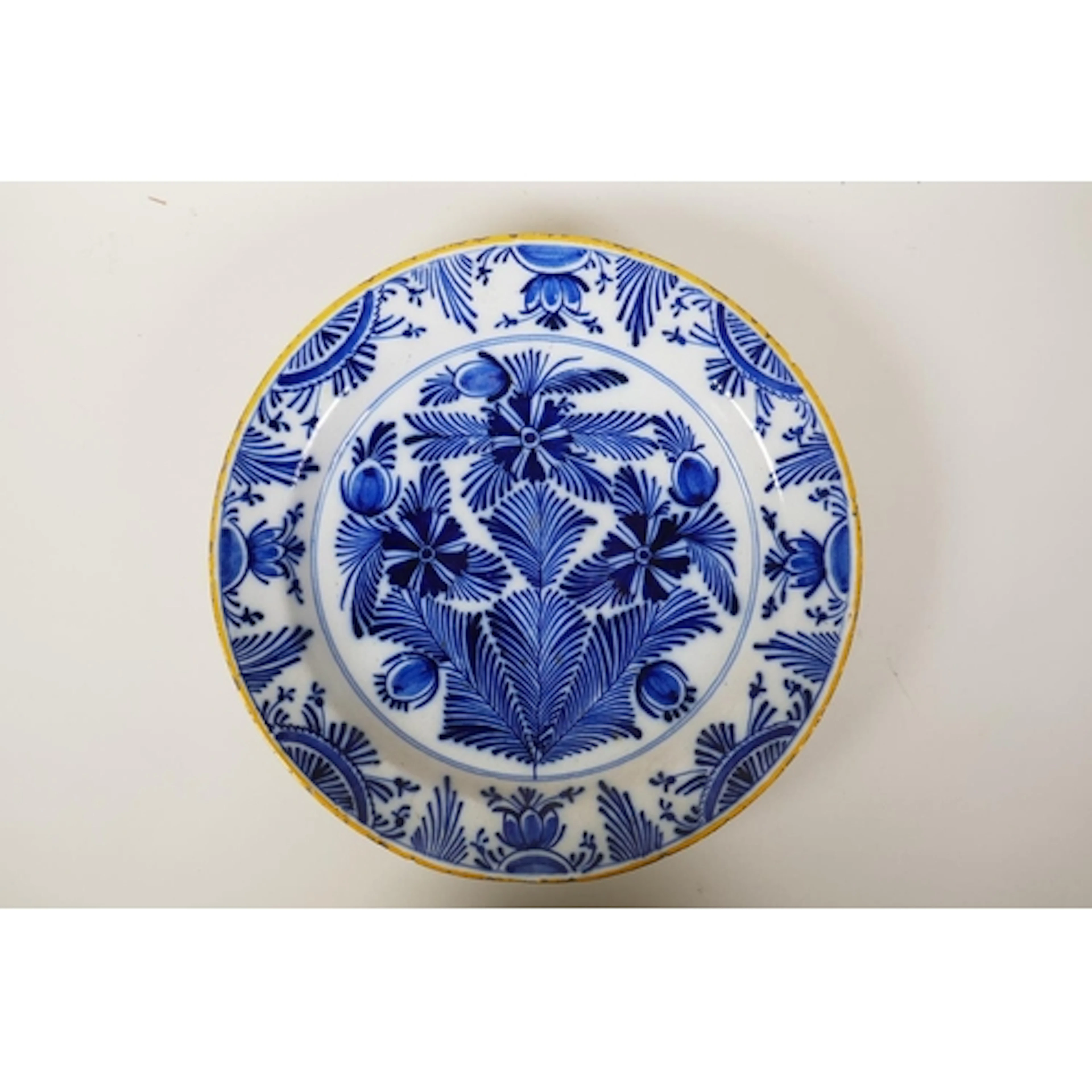 An C18th Dutch tin glazed charger with blue and white design...