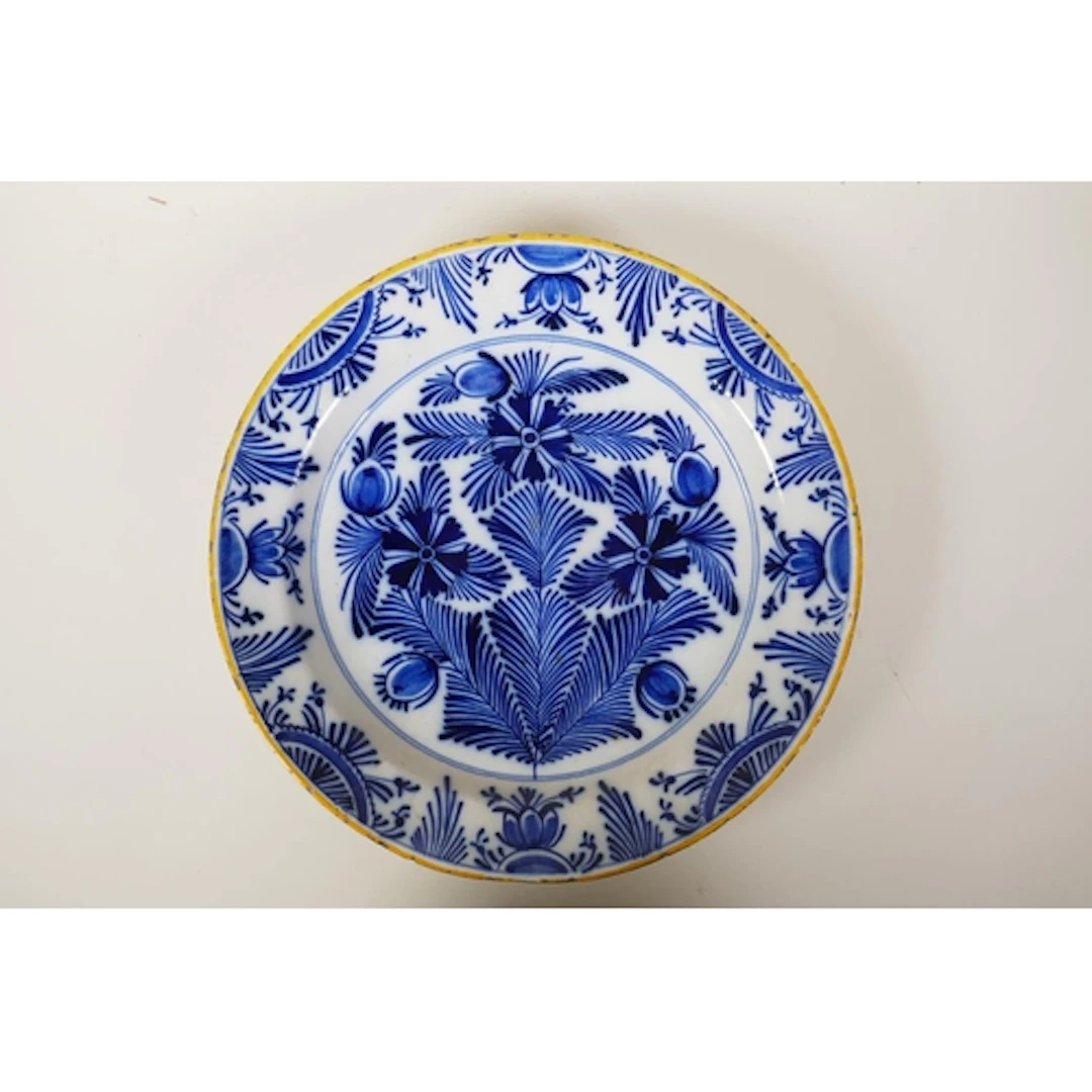 An C18th Dutch tin glazed charger with blue and white design...