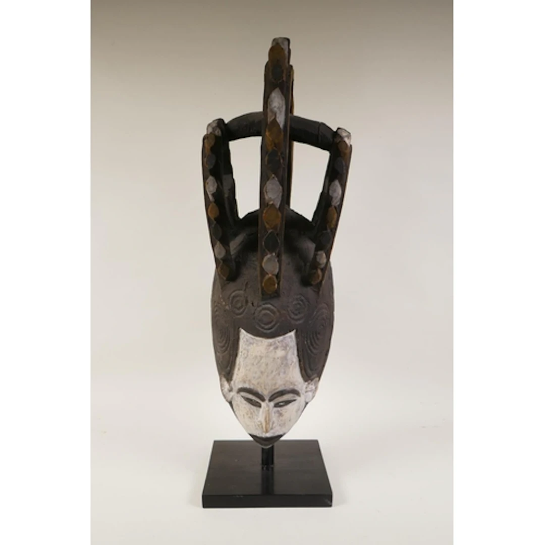 An African Igbo People of Nigeria traditional carved and pai...
