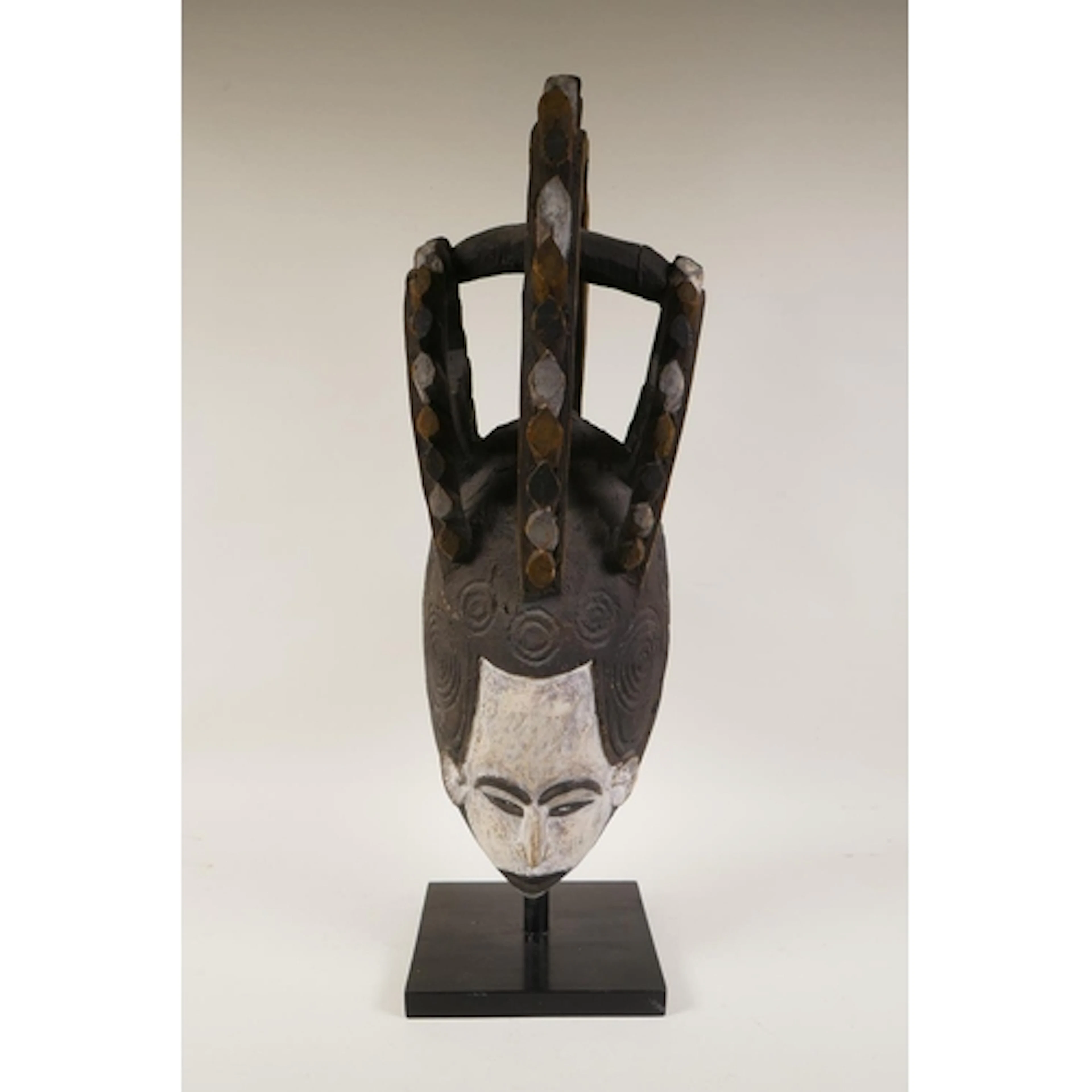 An African Igbo People of Nigeria traditional carved and pai...