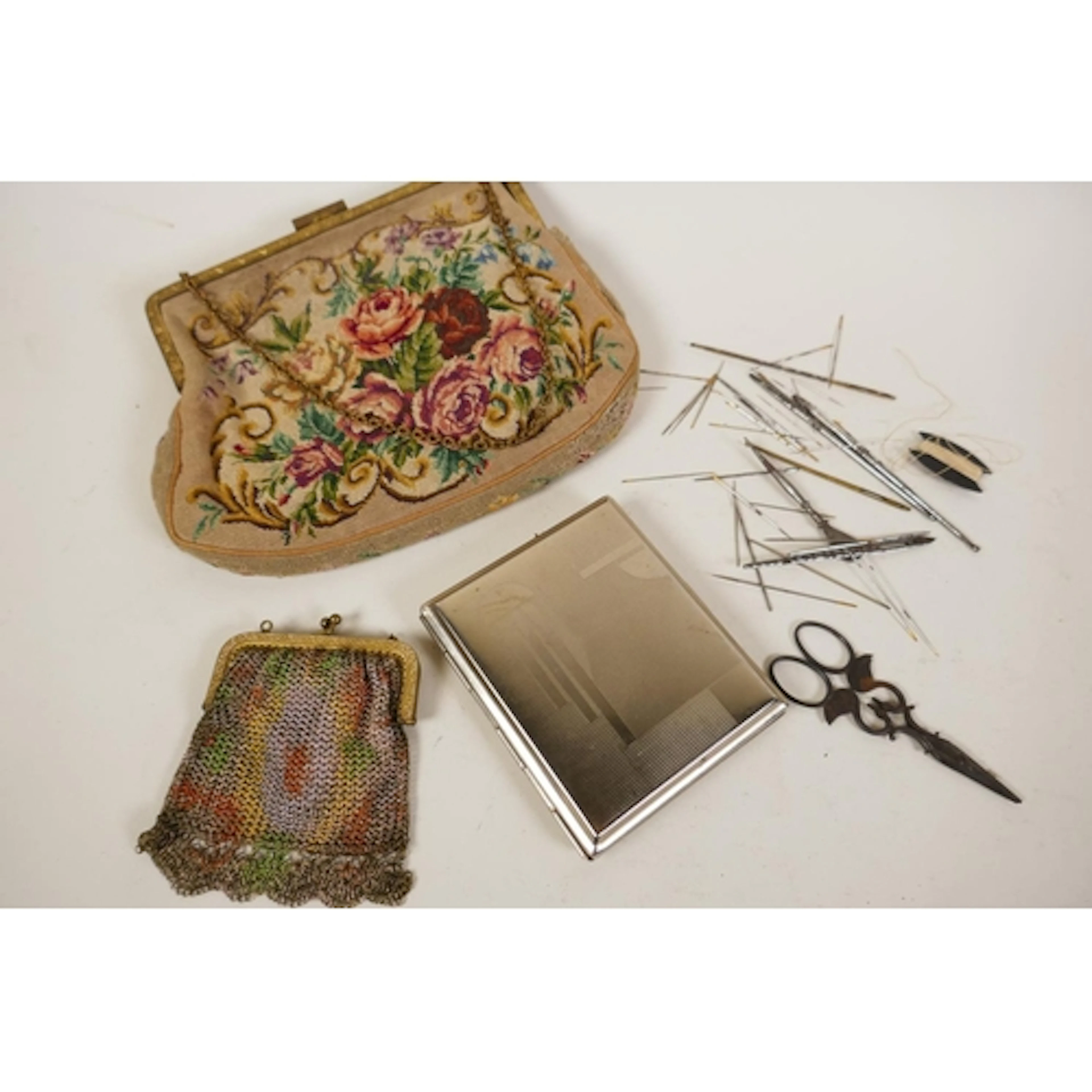 Antique mesh coin purse with silk lining and painted decorat...