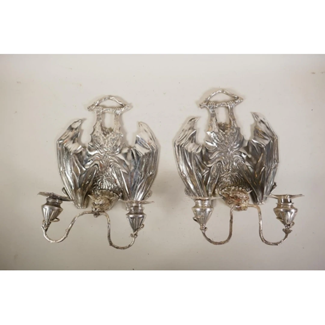 A pair of Gothic style plated metal two branchy 'bat' candle...