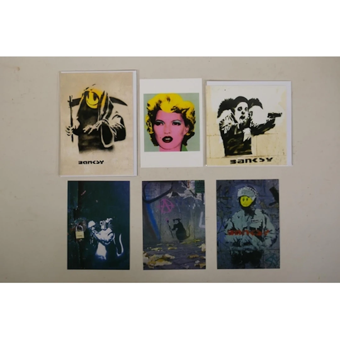 After Banksy, four postcards and two greeting cards, 12 x 17...