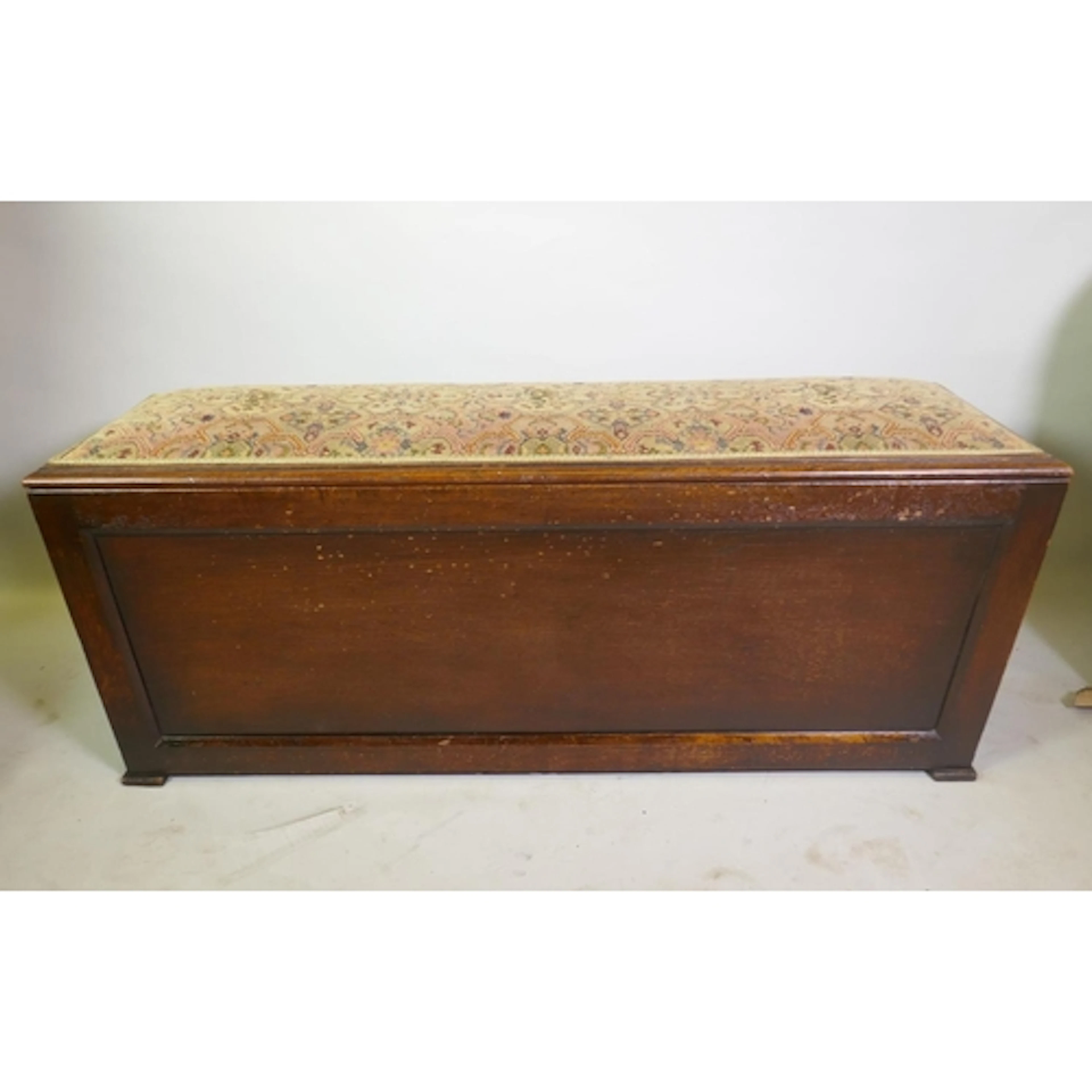 An oak veneered sarcophagus shaped ottoman, 120 x 40cm, 47cm...