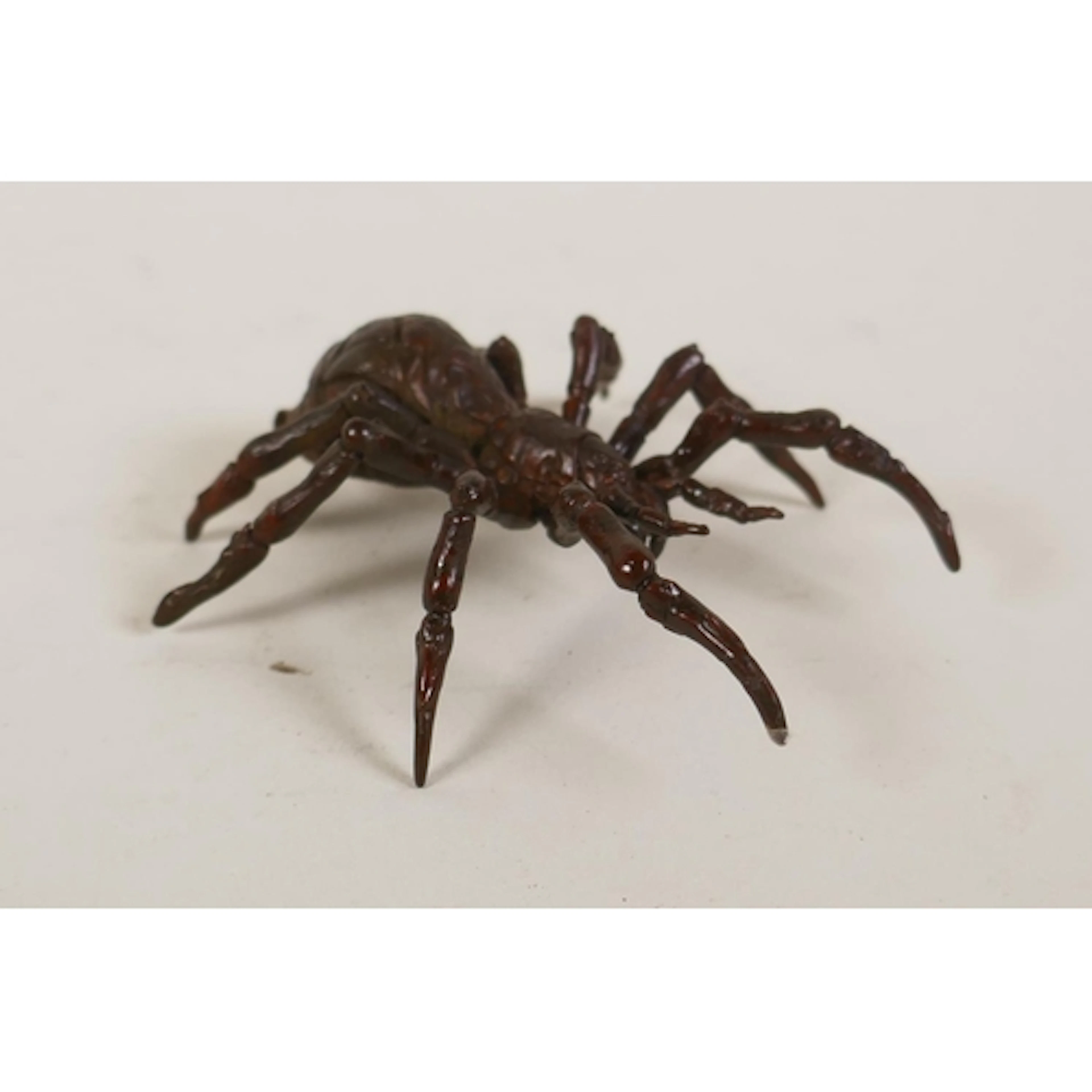 An oriental bronzed metal spider, impressed character mark t...