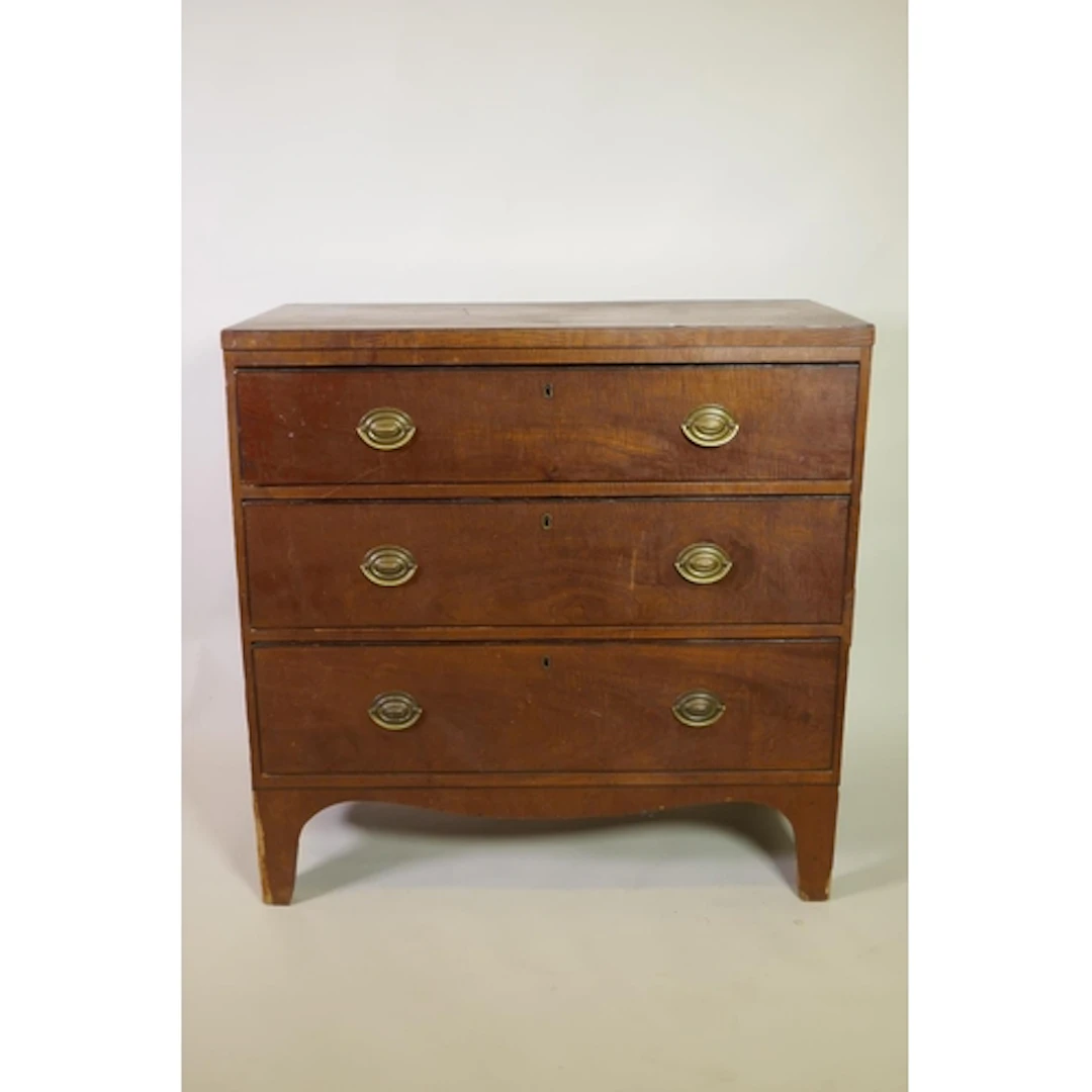An early C19th fiddle-back mahogany veneered chest of three ...
