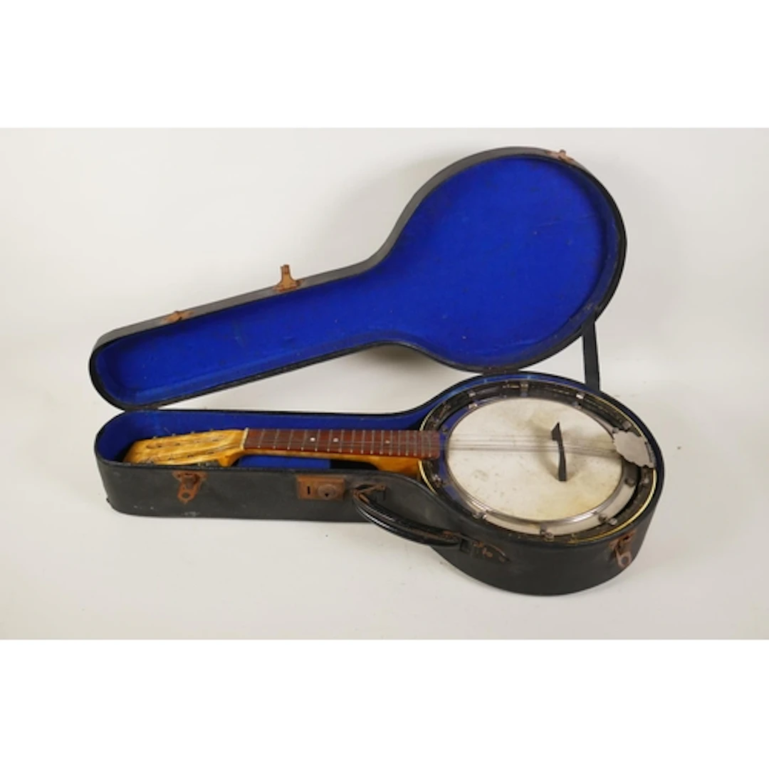 A vintage banjolin (mandolin-banjo), with pearl effect body ...