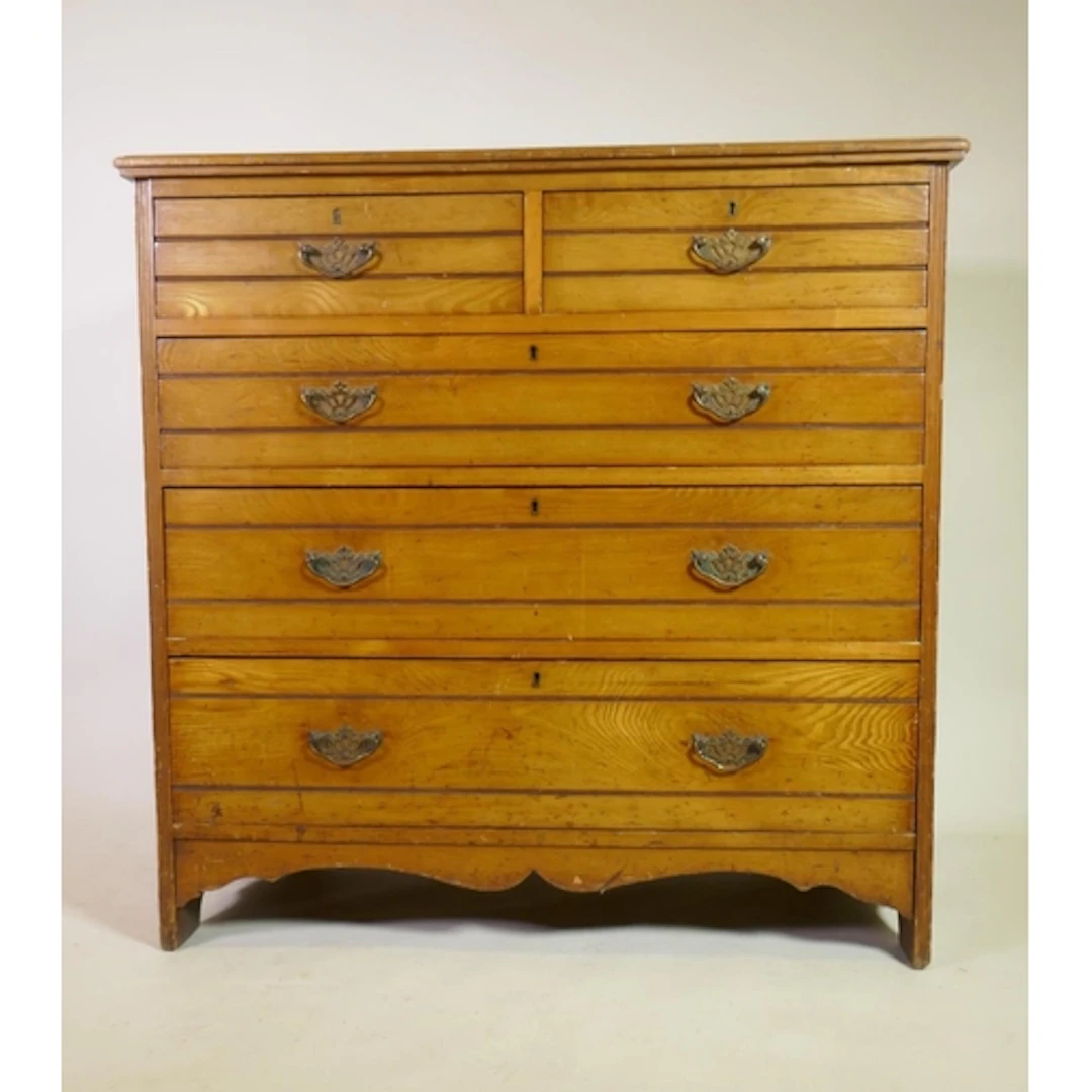 A Victorian golden ash chest of two over three drawers with ...