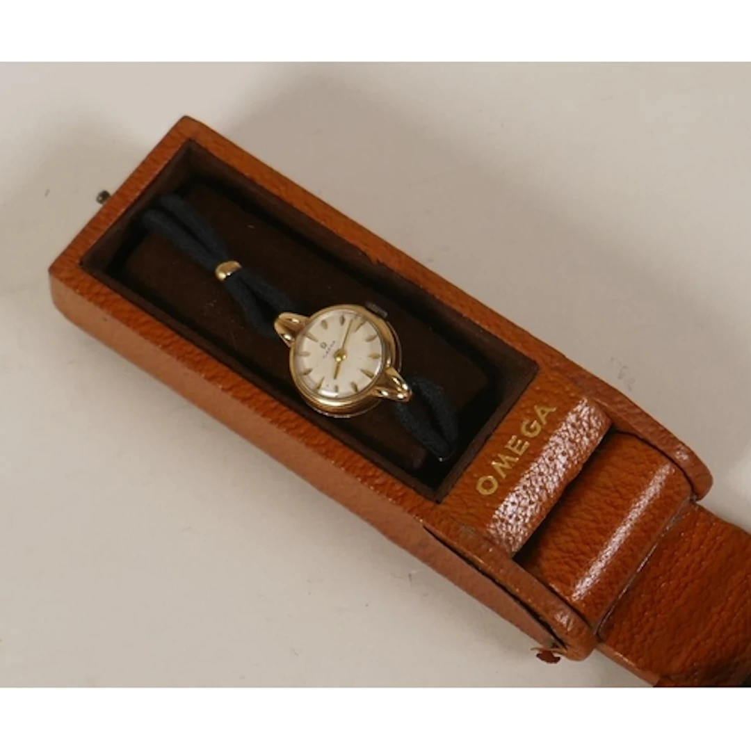 9ct gold lady's Omega cocktail watch in leather case