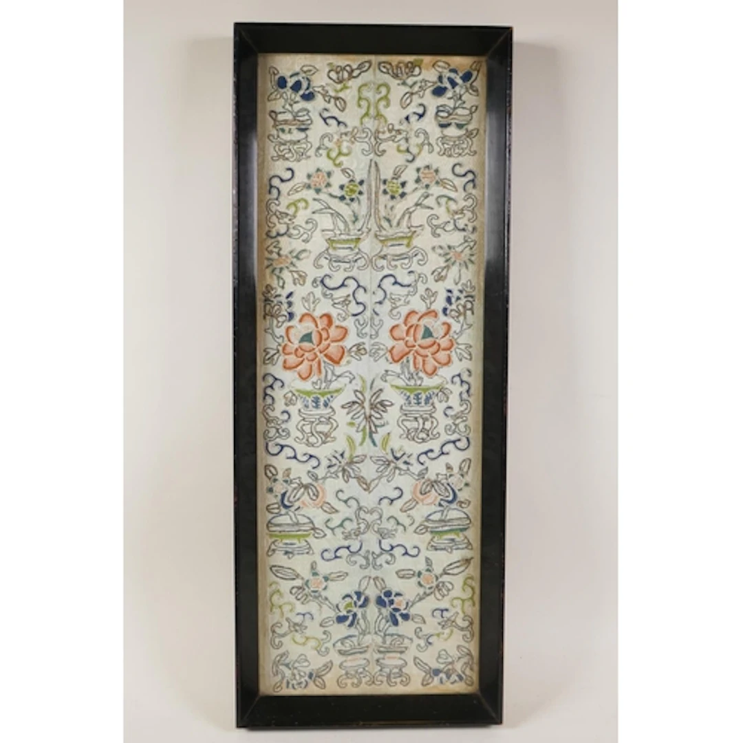 A set of Chinese late C19th embroidered silk robe sleeve cuf...