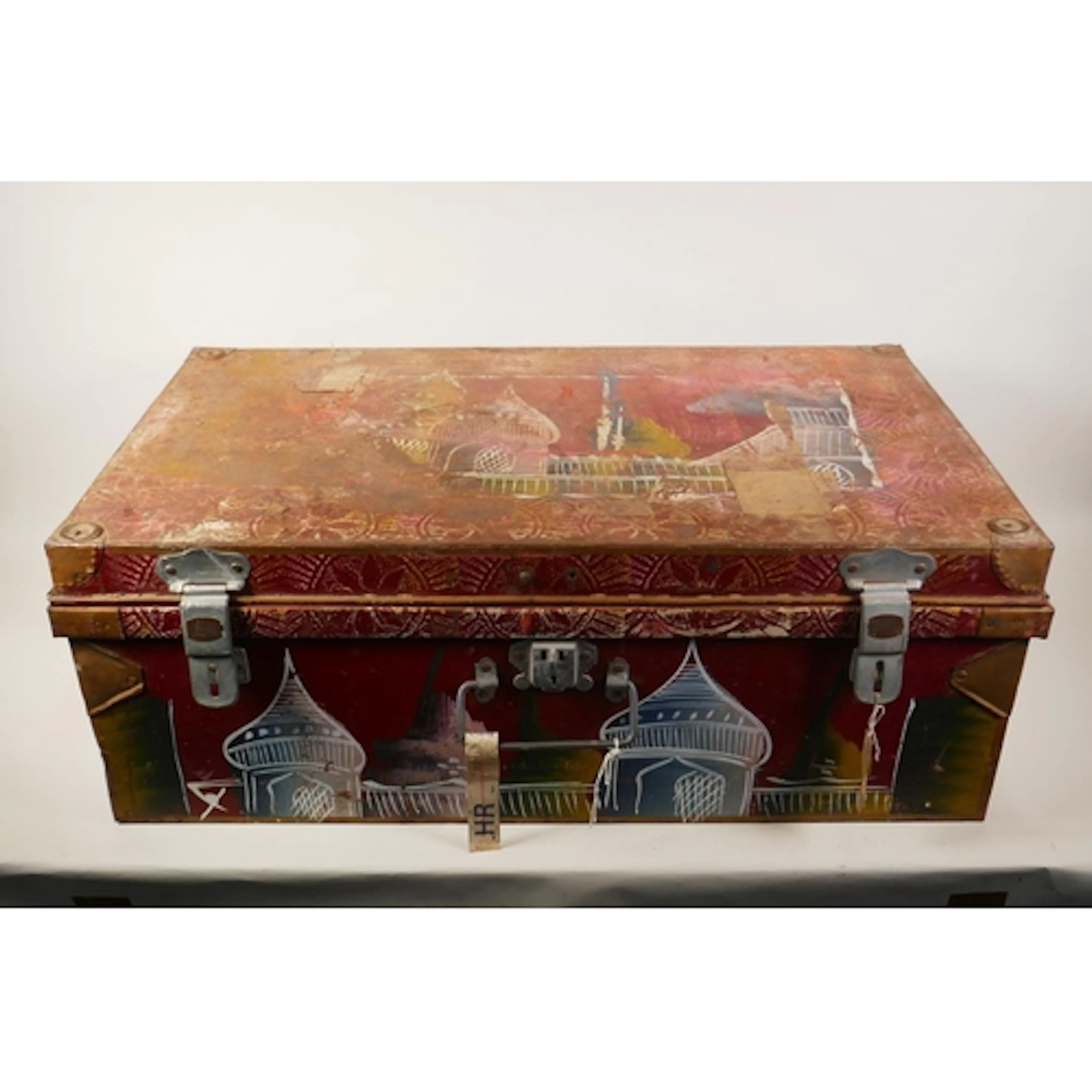 A painted metal travel trunk with Indian folk art style deco...