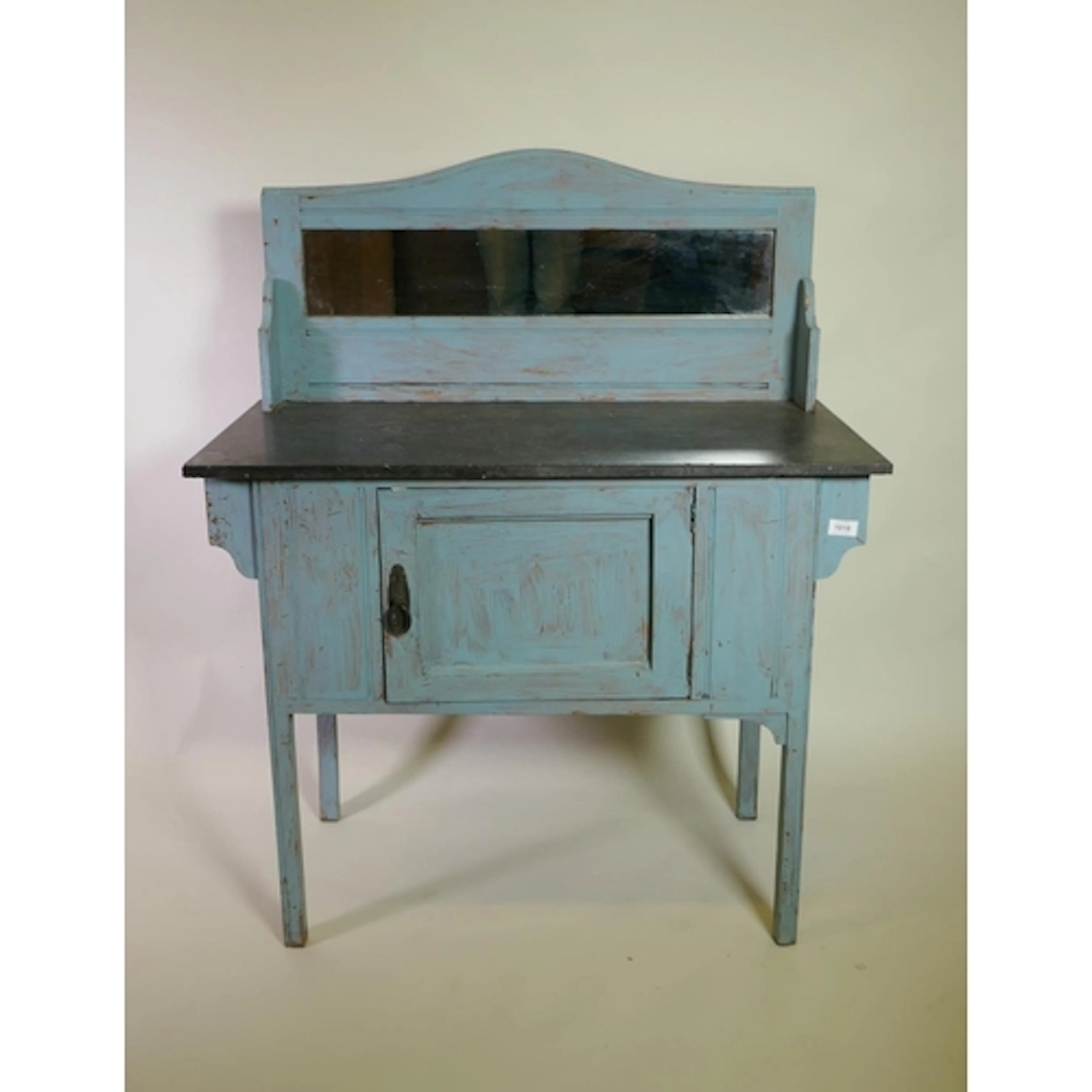 A Victorian painted pine washstand with fossil slate top and...