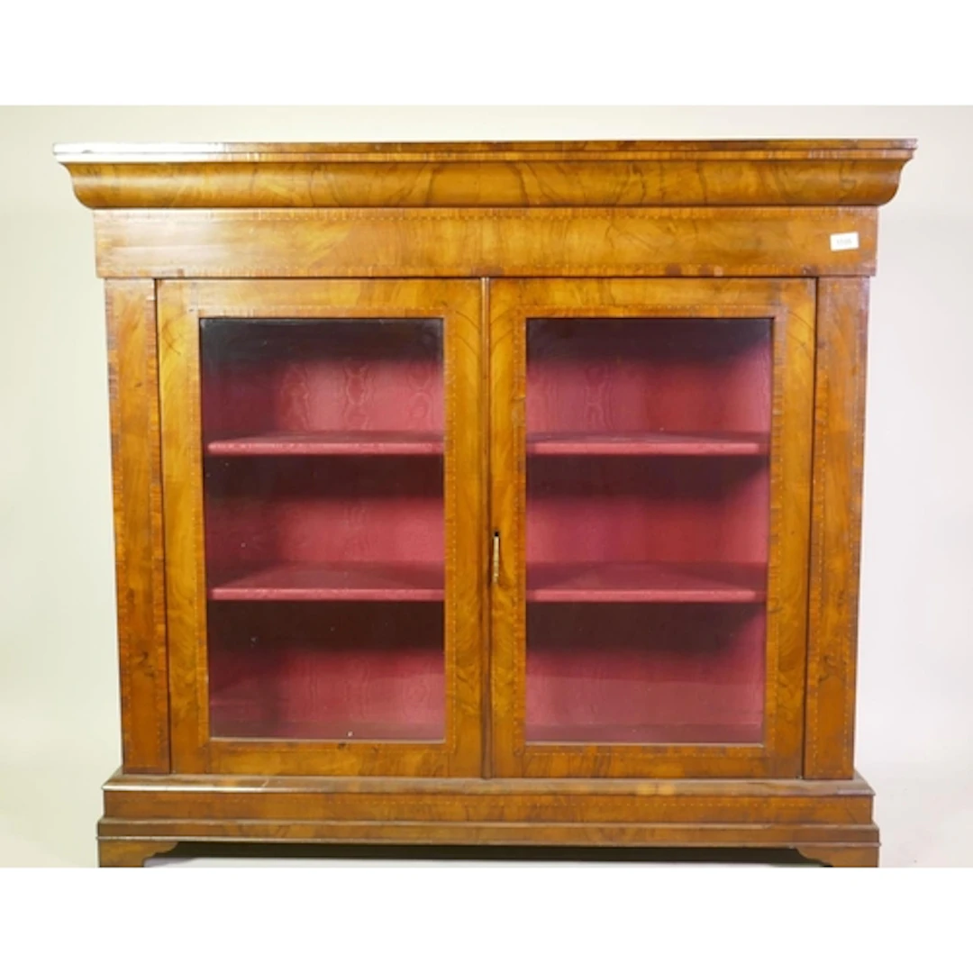 Victorian inlaid figured walnut pier cabinet with two glazed...